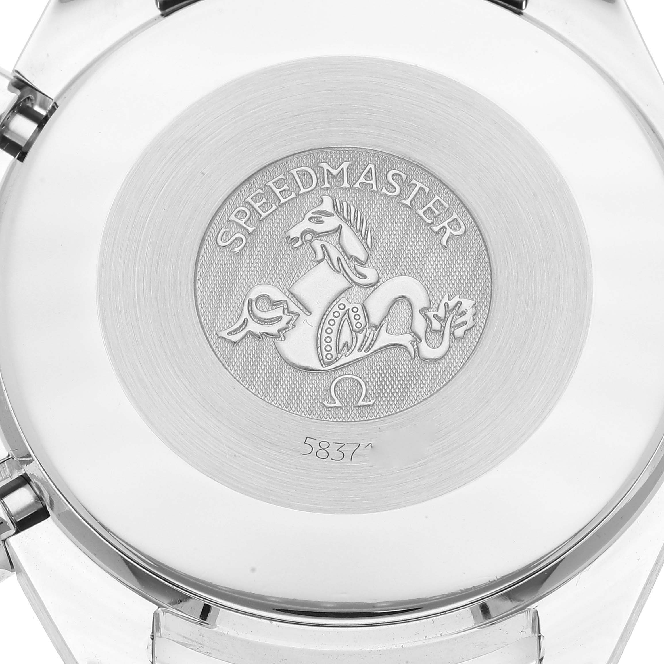 The image shows the back case of an Omega Speedmaster 3510.50.00 Men's Stainless Steel Black Dial 3510.50.00 Men's Stainless Steel Black Dial watch featuring a logo and model engraving.