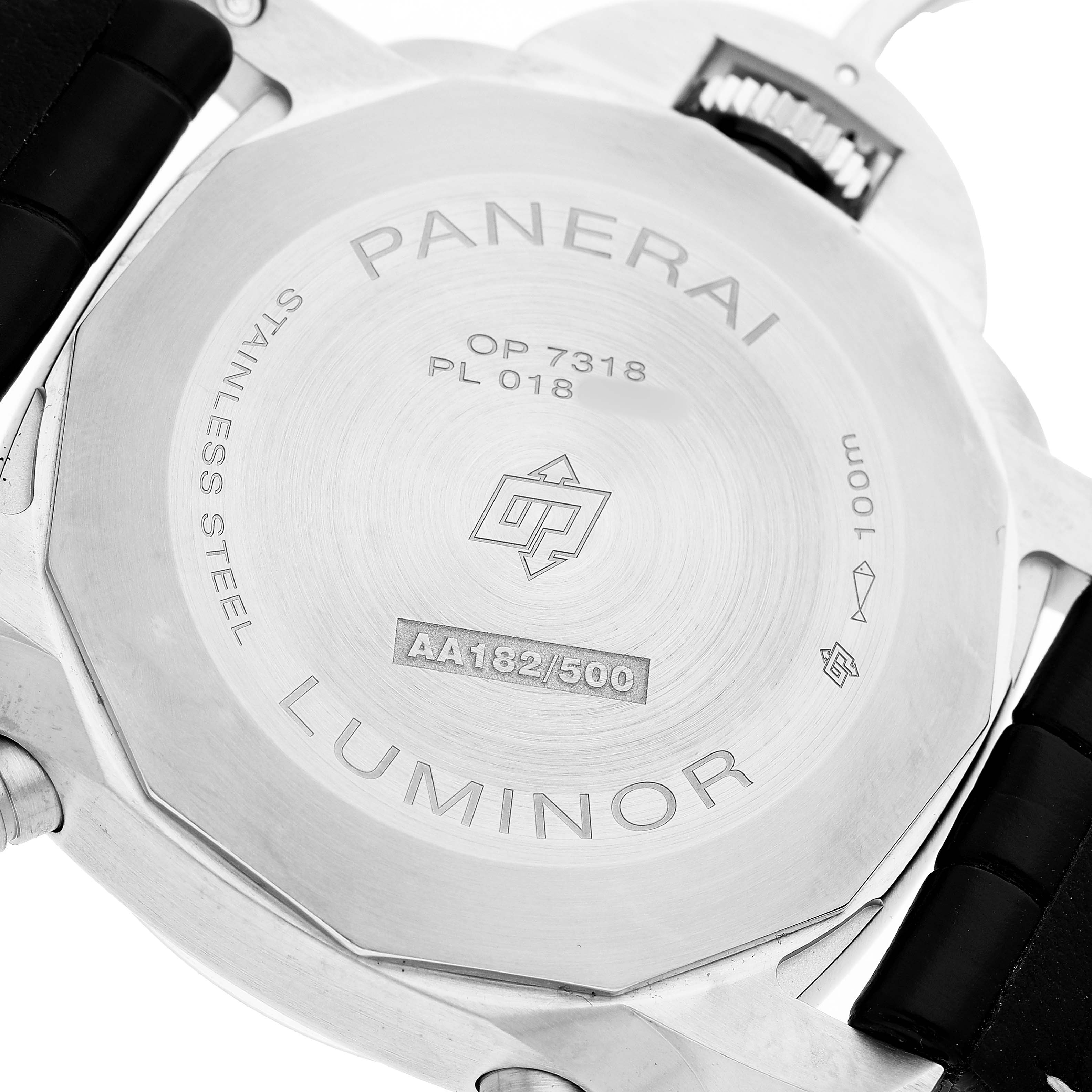 The image shows the back case of a Panerai Luminor PAM01218 Men's Stainless Steel Yellow Dial watch, highlighting engravings and limited edition details.