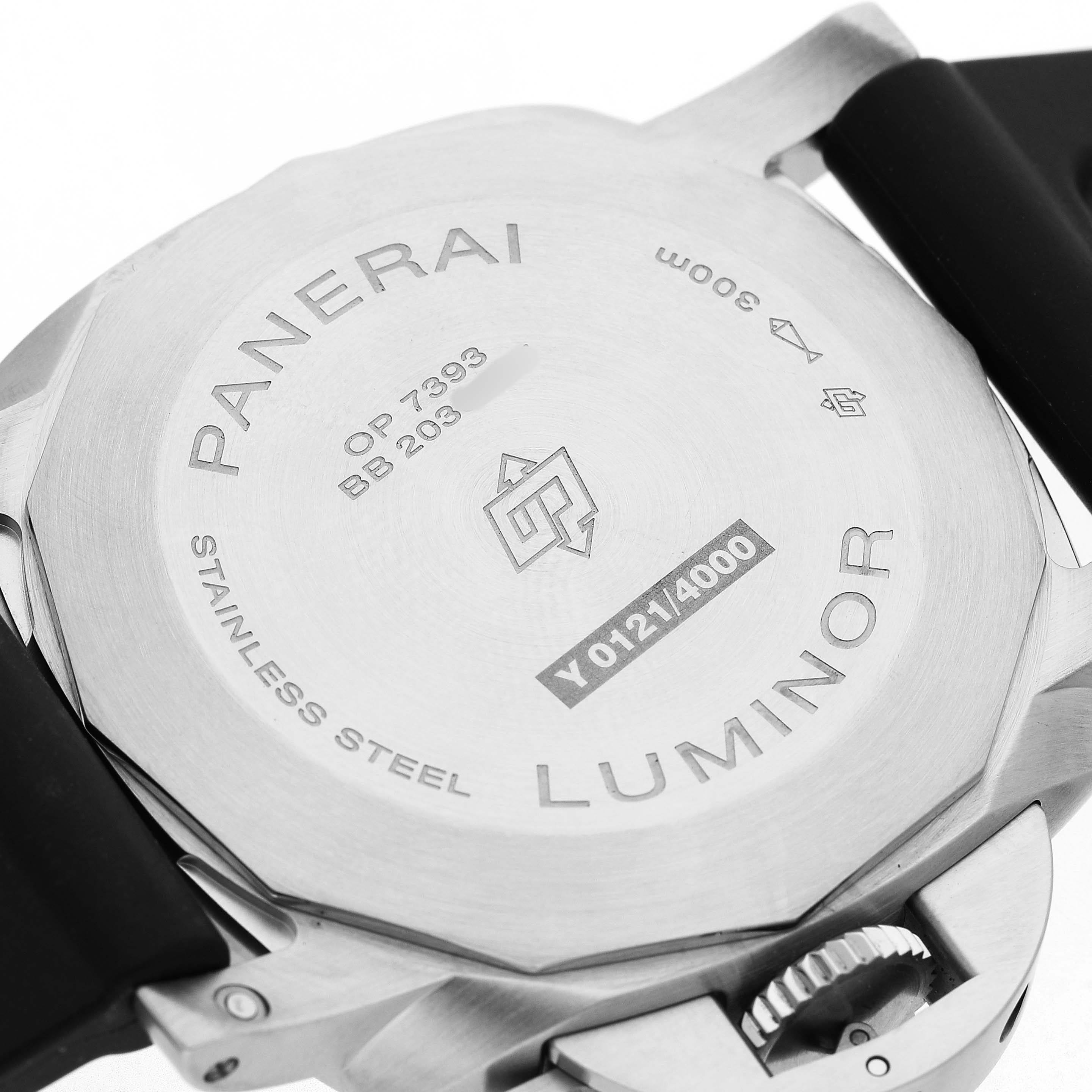 The image shows the back casing of a Panerai Luminor PAM01314 Men's Stainless Steel White Dial watch, displaying engravings and the crown guard at an angled view.