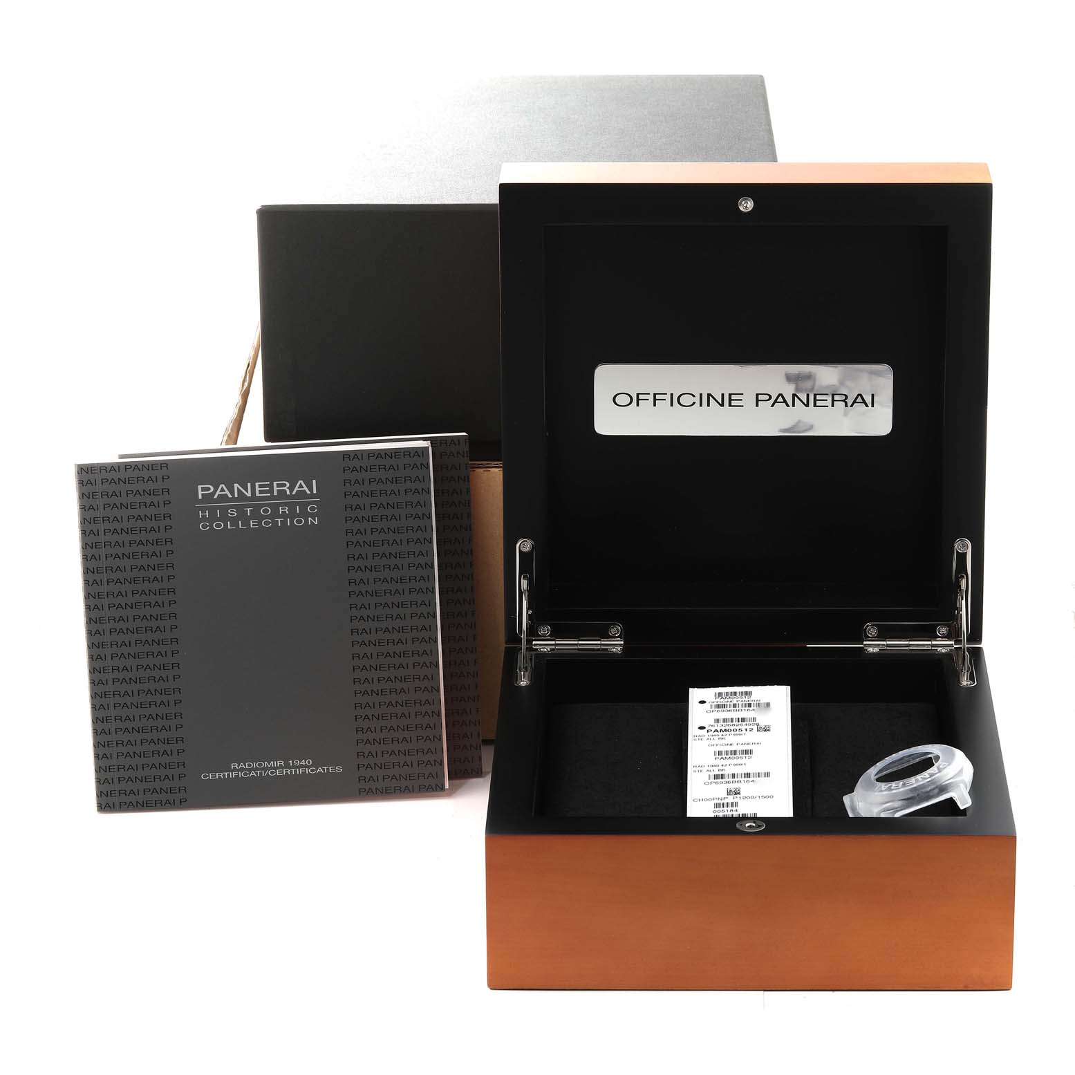 The image shows an open box for a Panerai Radiomir PAM00512 Men's Stainless Steel Black Dial PAM00512 Men's Stainless Steel Black Dial model with a certificate booklet beside it.