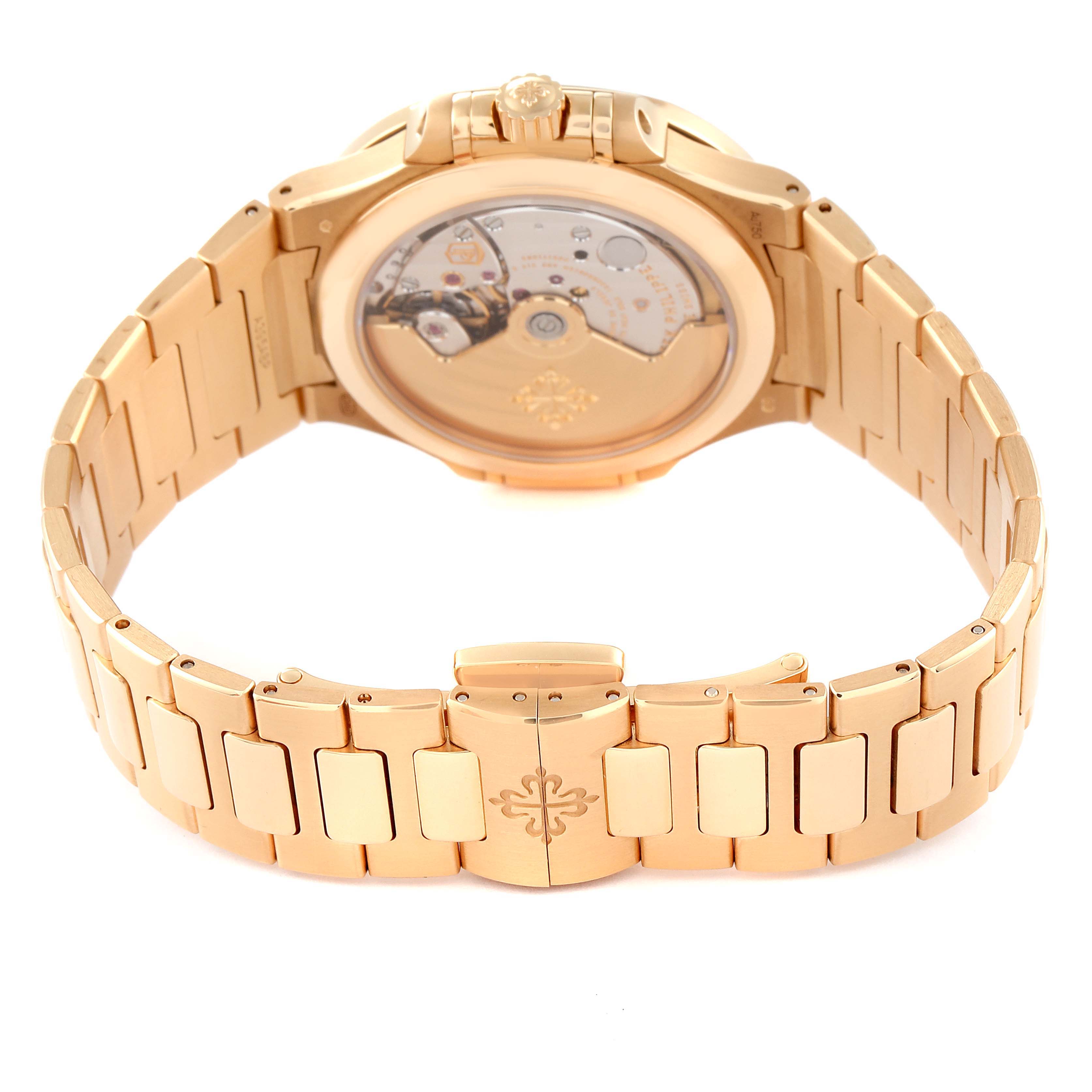The image shows the back of a Patek Philippe Nautilus 7118/1200R-001 Men's Rose Gold Silver Dial 7118/1200R-001 Men's Rose Gold Silver Dial watch, highlighting its case back and gold bracelet with the clasp.