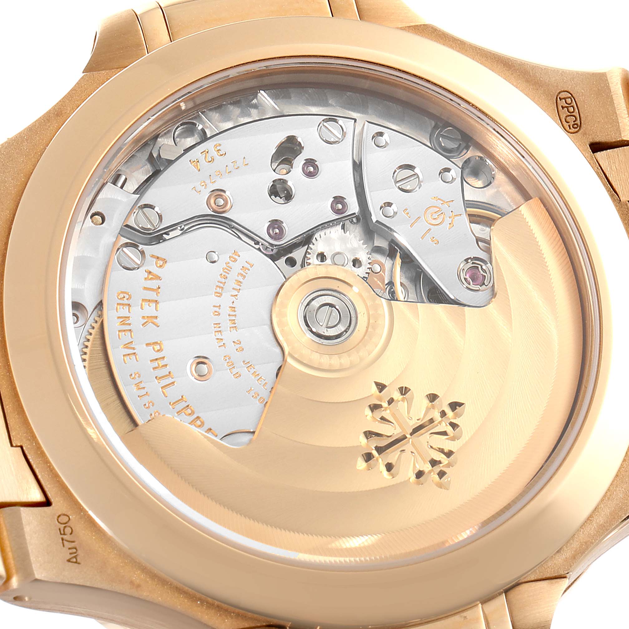 The image shows the back of the Patek Philippe Nautilus 7118/1200R-001 Men's Rose Gold Silver Dial 7118/1200R-001 Men's Rose Gold Silver Dial watch, highlighting the internal movement and rotor.