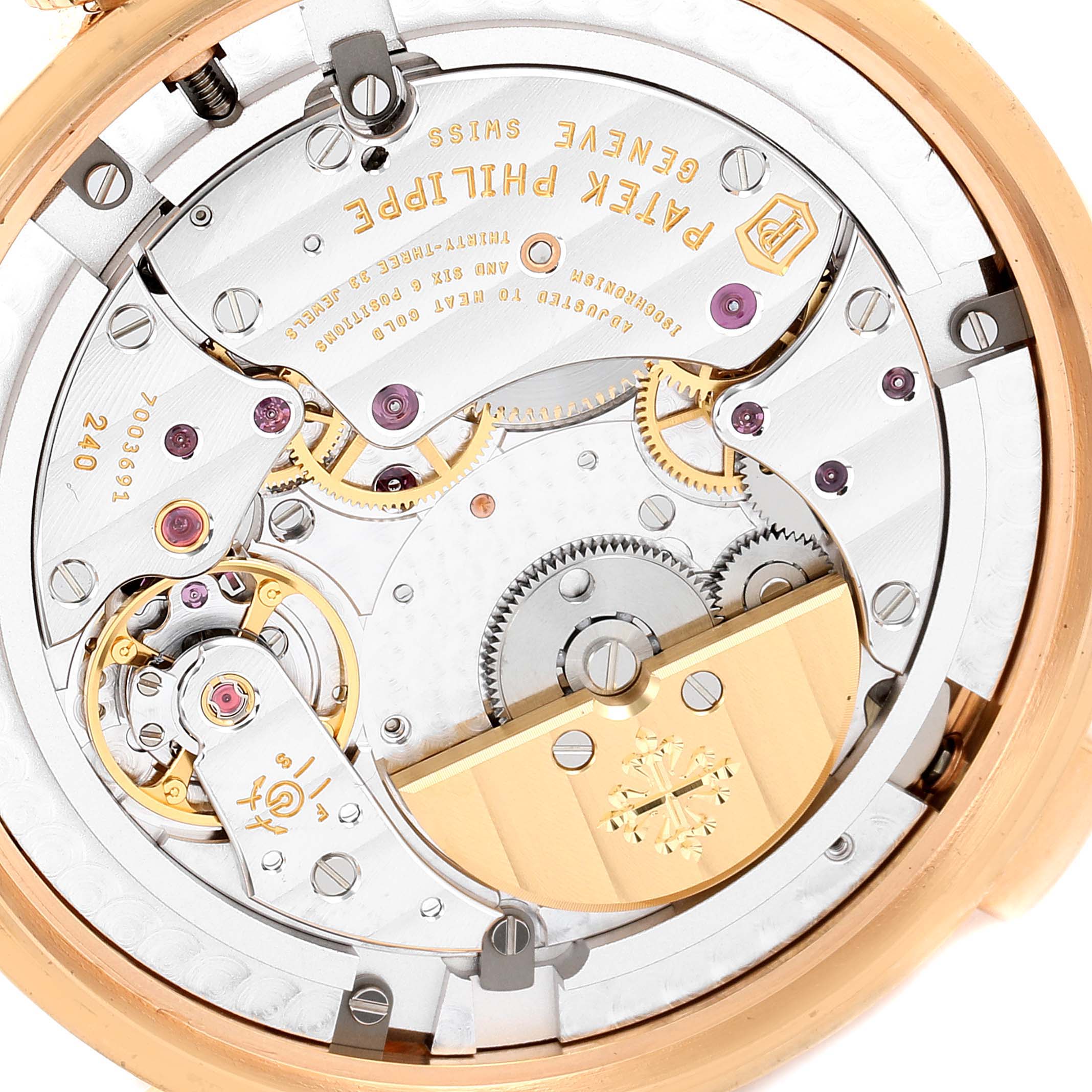 The image shows the intricate movement mechanism and internal components of a Patek Philippe Complications 5230R Men's Rose Gold Grey Dial 5230R Men's Rose Gold Grey Dial model watch, viewed from the back.