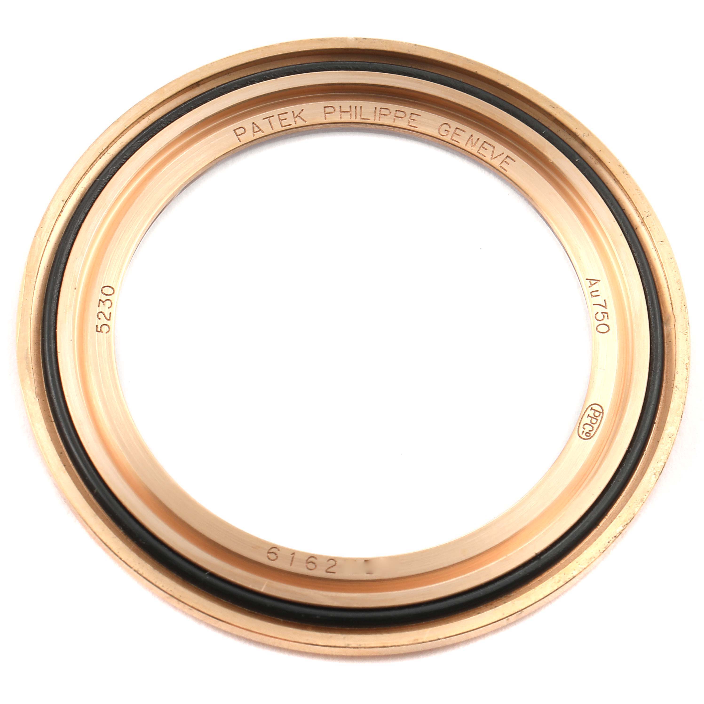 This image shows the bezel of a Patek Philippe Complications 5230R Men's Rose Gold Grey Dial 5230R Men's Rose Gold Grey Dial model, viewed from a top angle.