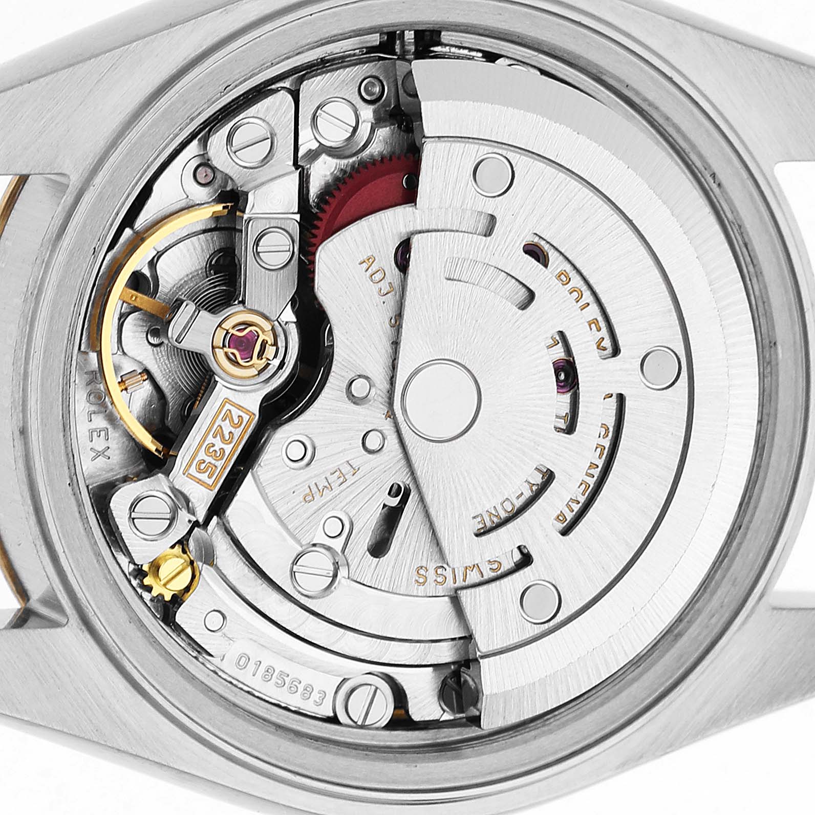 The image shows a close-up of the Rolex Datejust 79173 Women's Steel and Gold (two tone) Mother of Pearl Dial movement, highlighting the rotor, gears, and intricate mechanics.