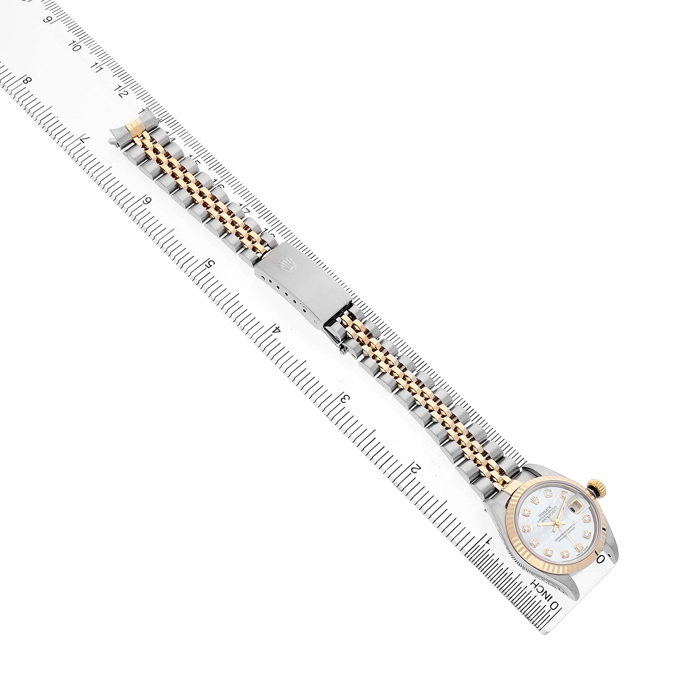 The Rolex Datejust 79173 Women's Steel and Gold (two tone) Mother of Pearl Dial watch is shown from above, featuring the face, bezel, and partially extended two-tone bracelet.