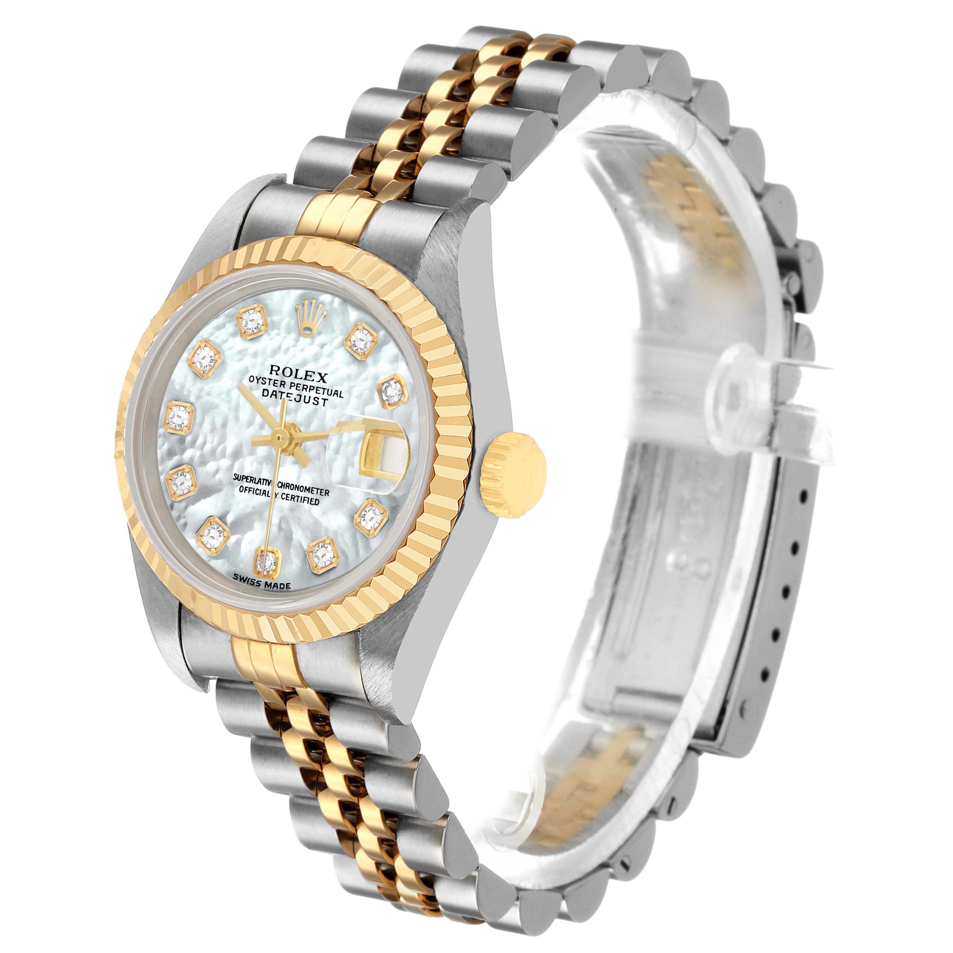 The Rolex Datejust 79173 Women's Steel and Gold (two tone) Mother of Pearl Dial watch is angled to show the face, bezel, crown, two-tone bracelet, and parts of the clasp.
