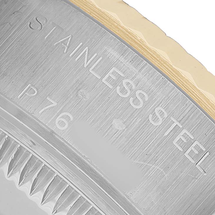 The image shows a close-up of the stainless steel case back of a Rolex Datejust 79173 Women's Steel and Gold (two tone) Mother of Pearl Dial.