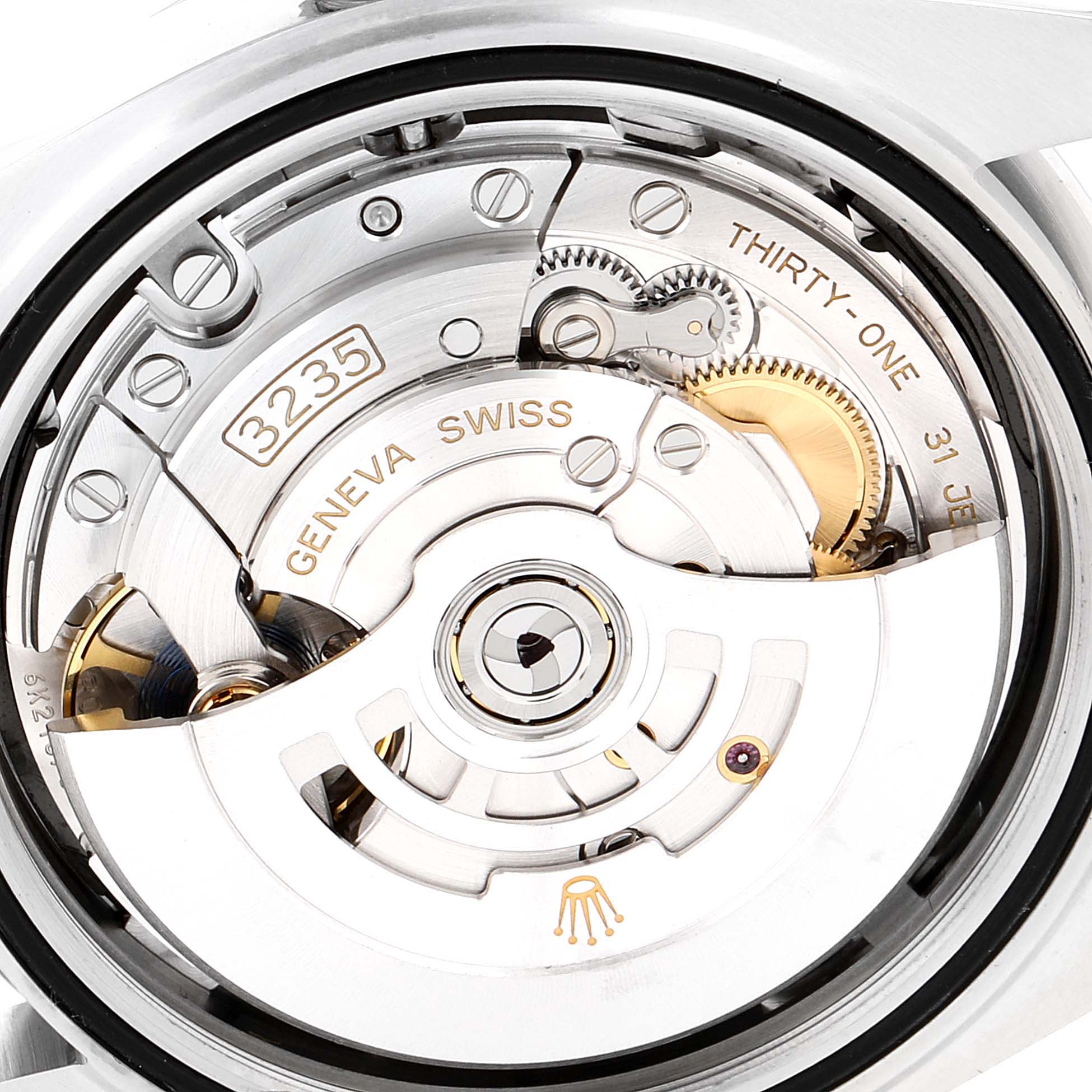 The image shows a close-up of the movement and inner mechanism of the Rolex Datejust 41 126300 Men
s Stainless Steel Black Dial 126300 Men
s Stainless Steel Black Dial model.