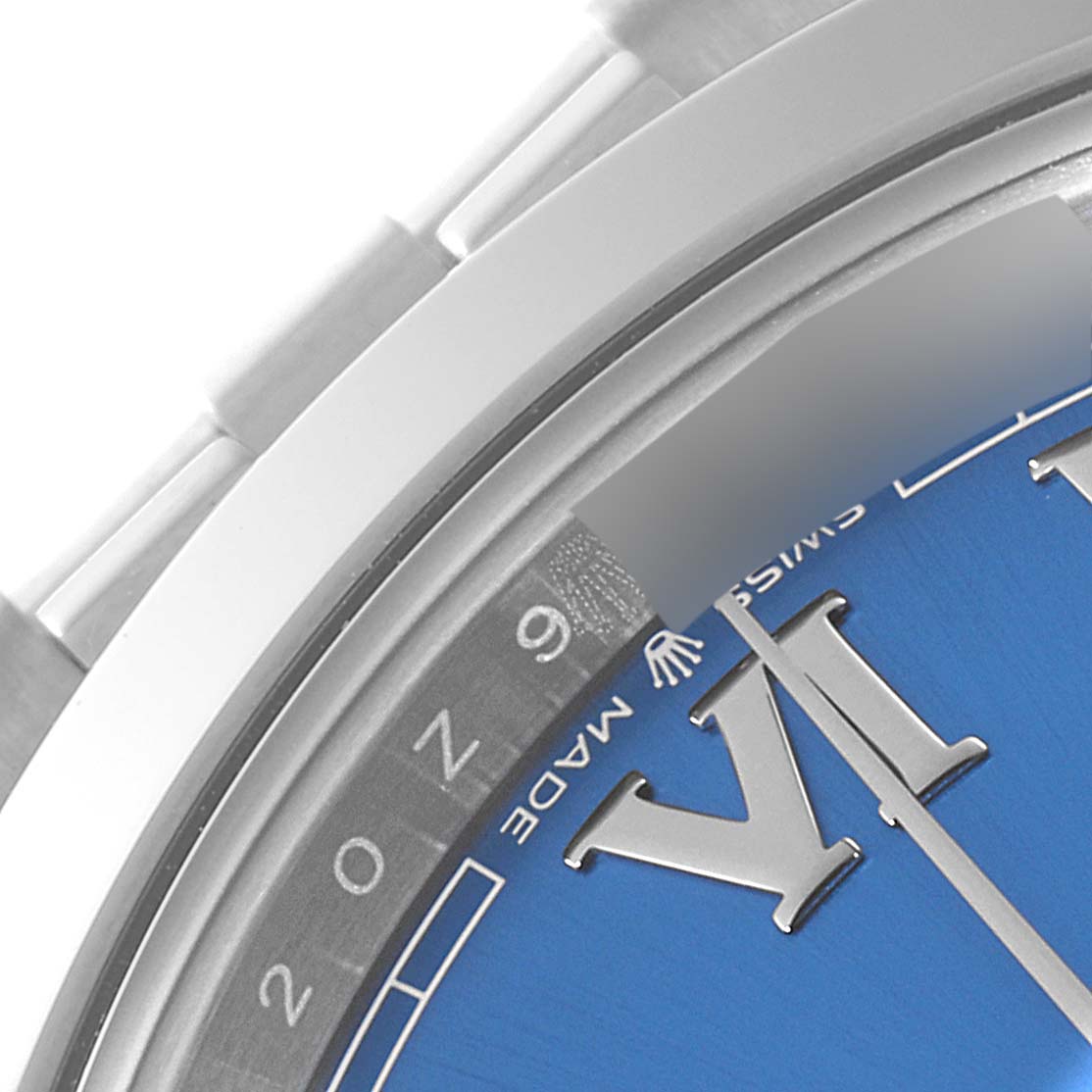 This image shows a close-up of the dial and part of the case of a Rolex Datejust 41 126300 Men's Stainless Steel Blue Dial 126300 Men's Stainless Steel Blue Dial watch, highlighting the Roman numeral hour markers and part of the bracelet.