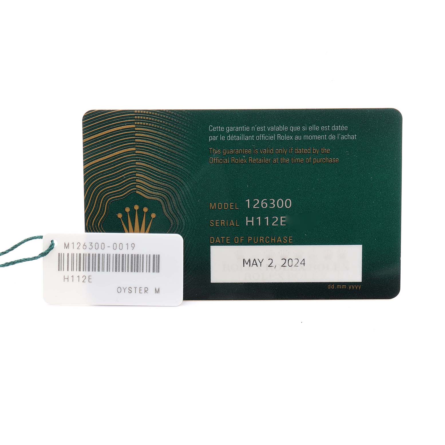 The image shows the warranty card for the Rolex Datejust 41 126300 Men
s Stainless Steel Green Dial 126300 Men
s Stainless Steel Green Dial, model 126300, with serial number and purchase date details.