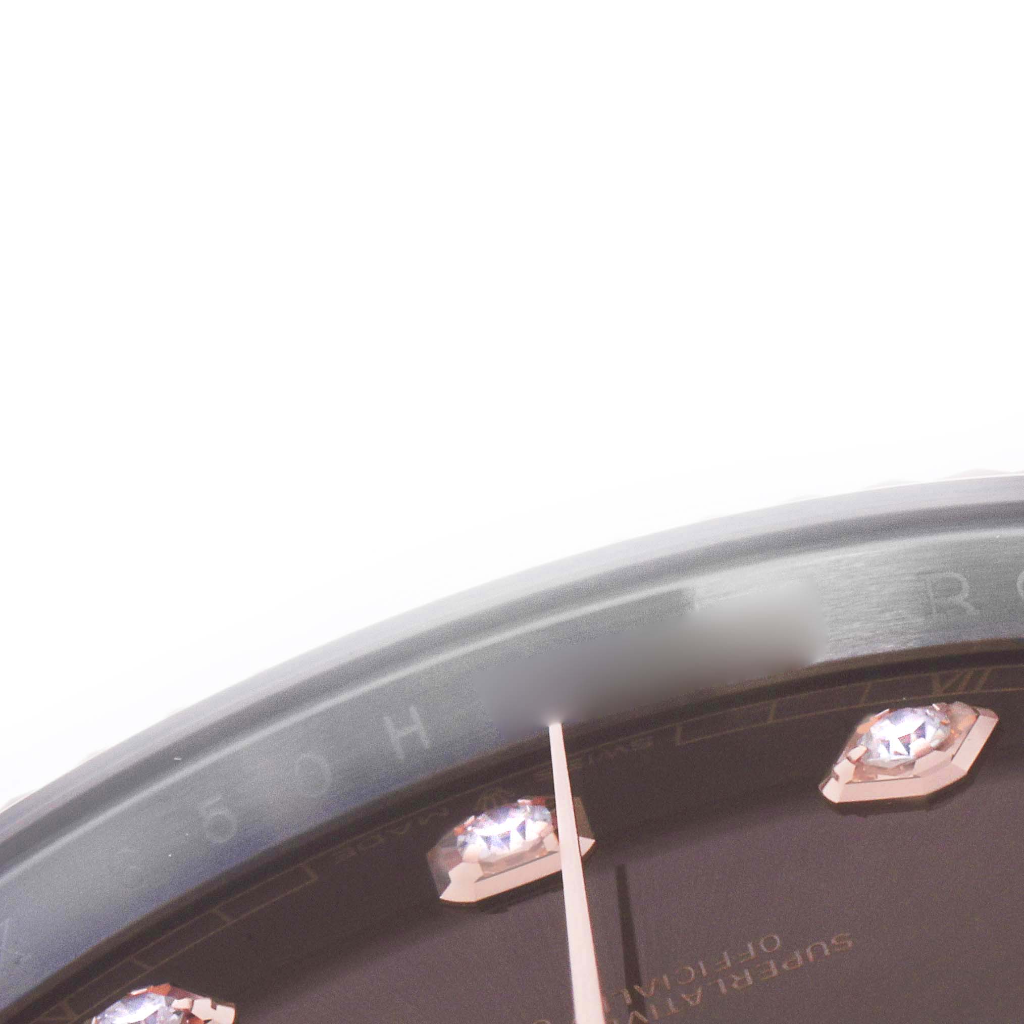 The image shows a close-up of the dial and bezel of the Rolex Datejust 41 126331 Men
s Steel and Gold (two tone) Brown Dial 126331 Men
s Steel and Gold (two tone) Brown Dial, highlighting diamond hour markers.