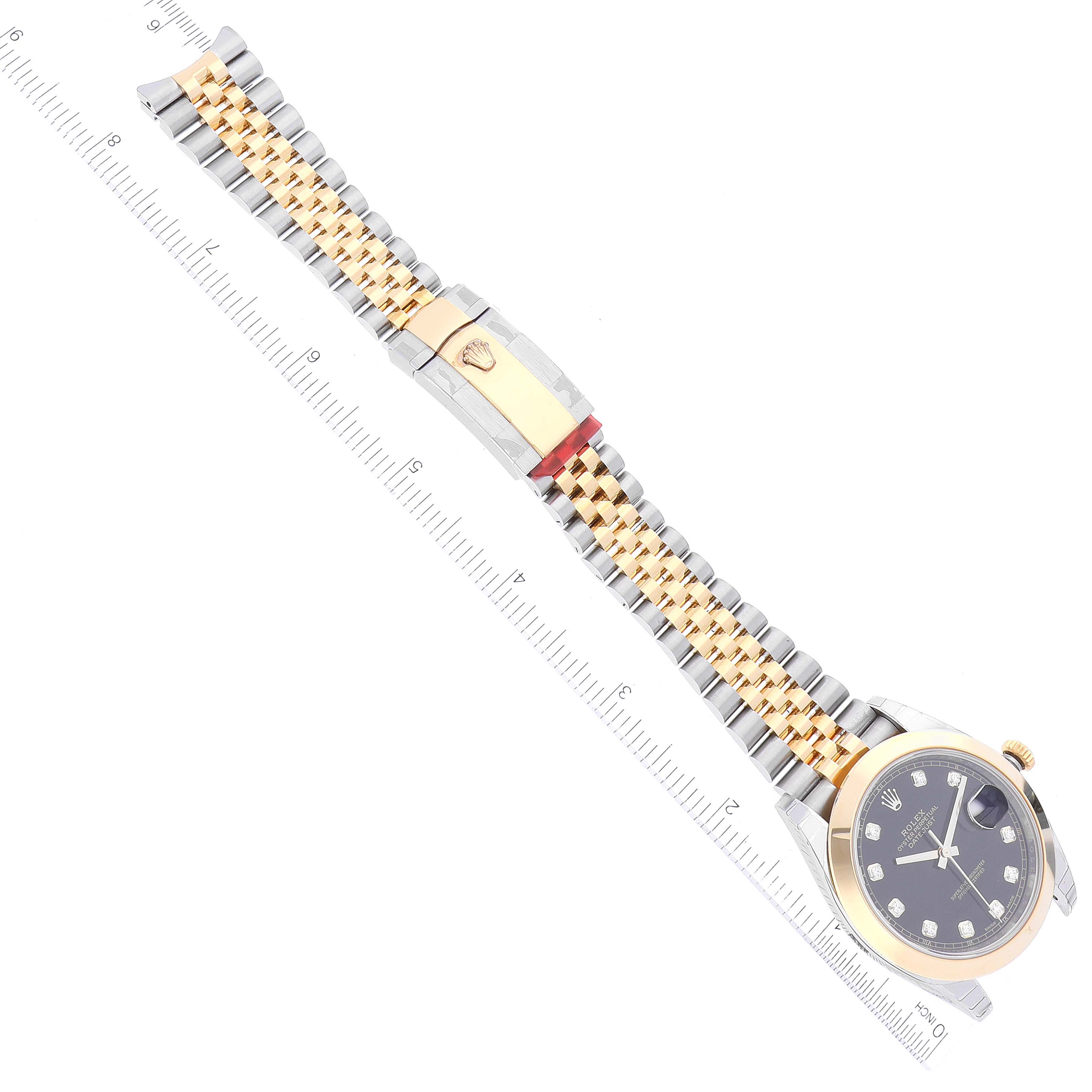 The image shows an overhead view of a Rolex Datejust 41 126303 Men's Steel and Gold (two tone) Black Dial 126303 Men's Steel and Gold (two tone) Black Dial watch, featuring the face, bezel, bracelet, and clasp.