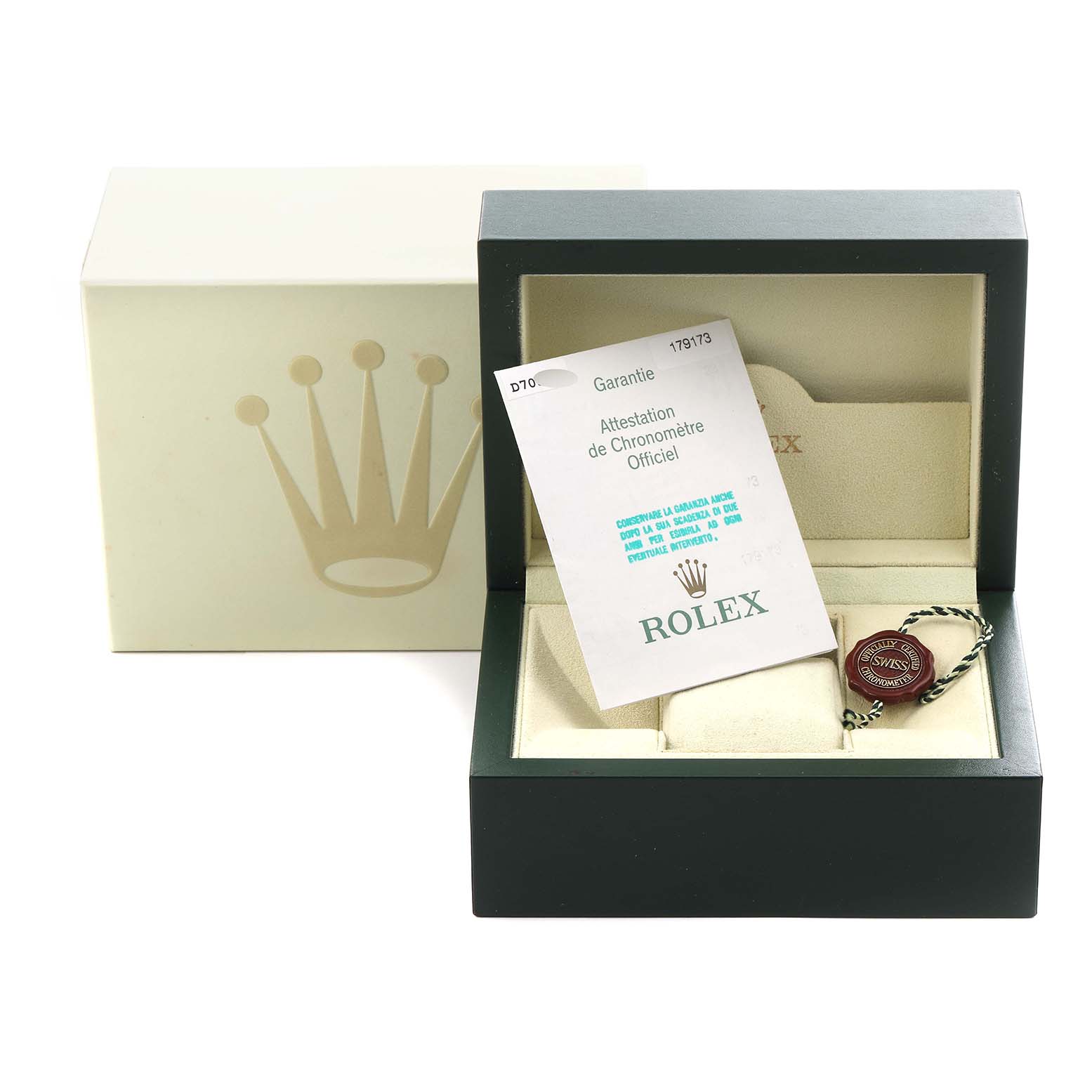 The image shows a Rolex Datejust 179173 Women
s Steel and Gold (two tone) Silver Dial 179173 Women
s Steel and Gold (two tone) Silver Dial box with a warranty card and seal from a front angle, showcasing the exterior and interior packaging.