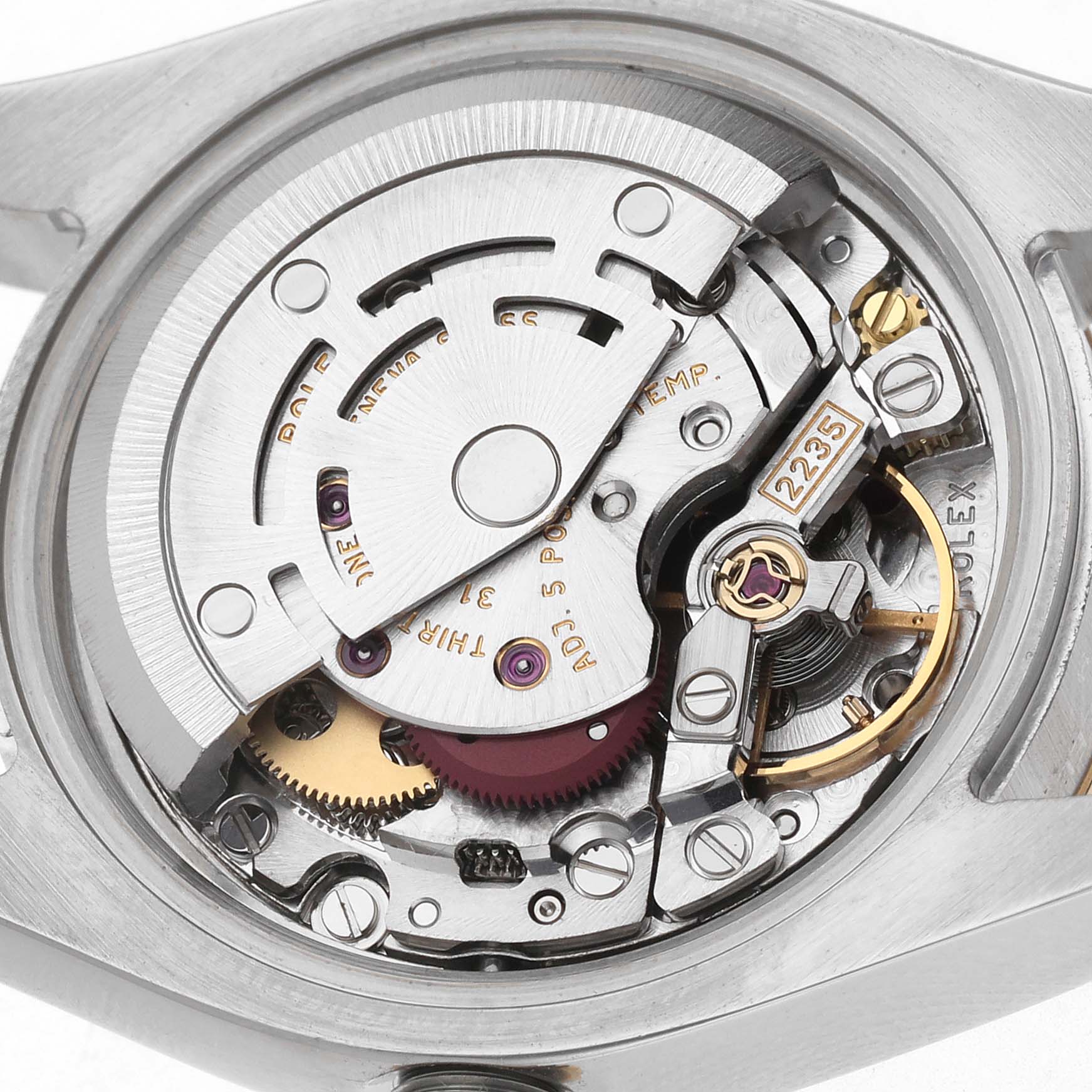The image shows the movement of a Rolex Datejust 179173 Women
s Steel and Gold (two tone) Silver Dial 179173 Women
s Steel and Gold (two tone) Silver Dial, focusing on the intricate internal mechanism from a top-down angle.