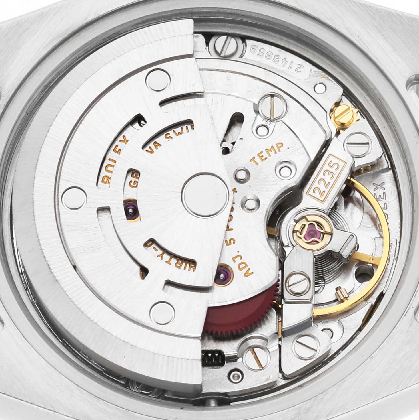 The image shows the movement of a Rolex Datejust 179173 Women's Steel and Gold (two tone) Mother of Pearl Dial watch, highlighting the rotor and balance wheel from the back.