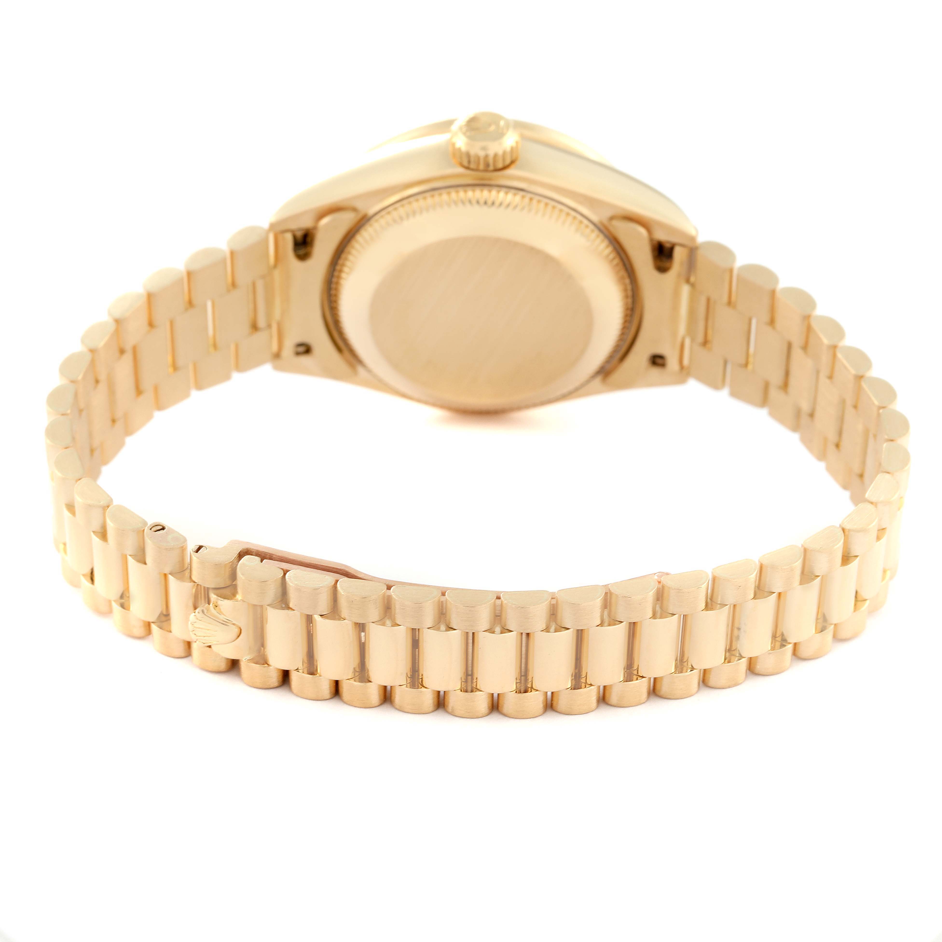 The image shows the back case and bracelet of a Rolex President 69158 Women
s Yellow Gold Champagne Dial 69158 Women
s Yellow Gold Champagne Dial model watch from an overhead angle.