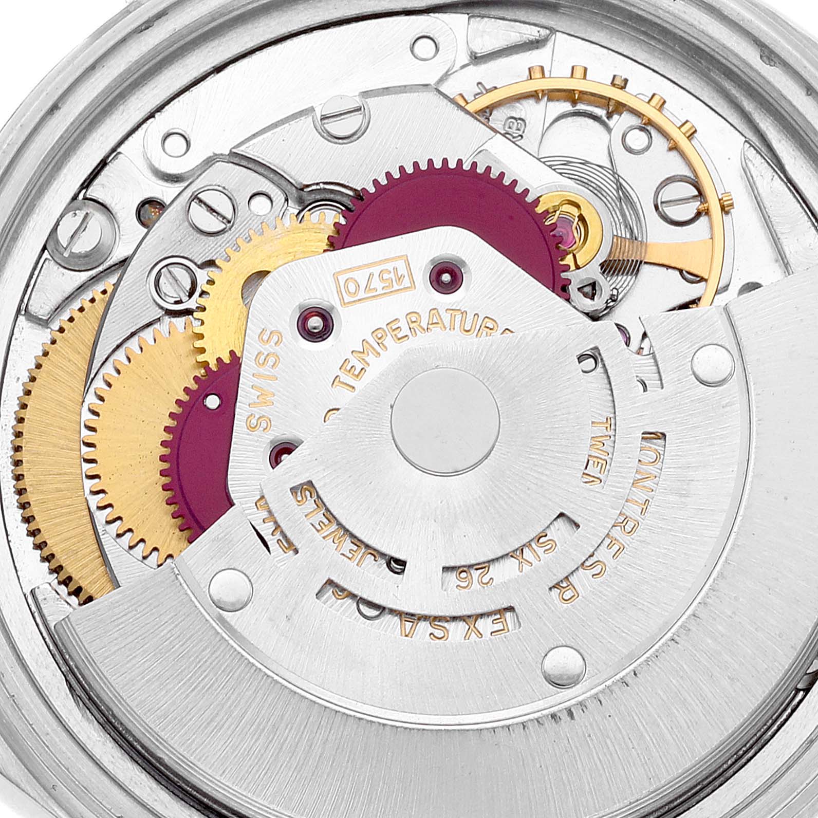 This close-up shot shows the intricate movement and internal mechanism of the Rolex Vintage Collection 1601 Men's Stainless Steel Silver Dial 1601 Men's Stainless Steel Silver Dial model.