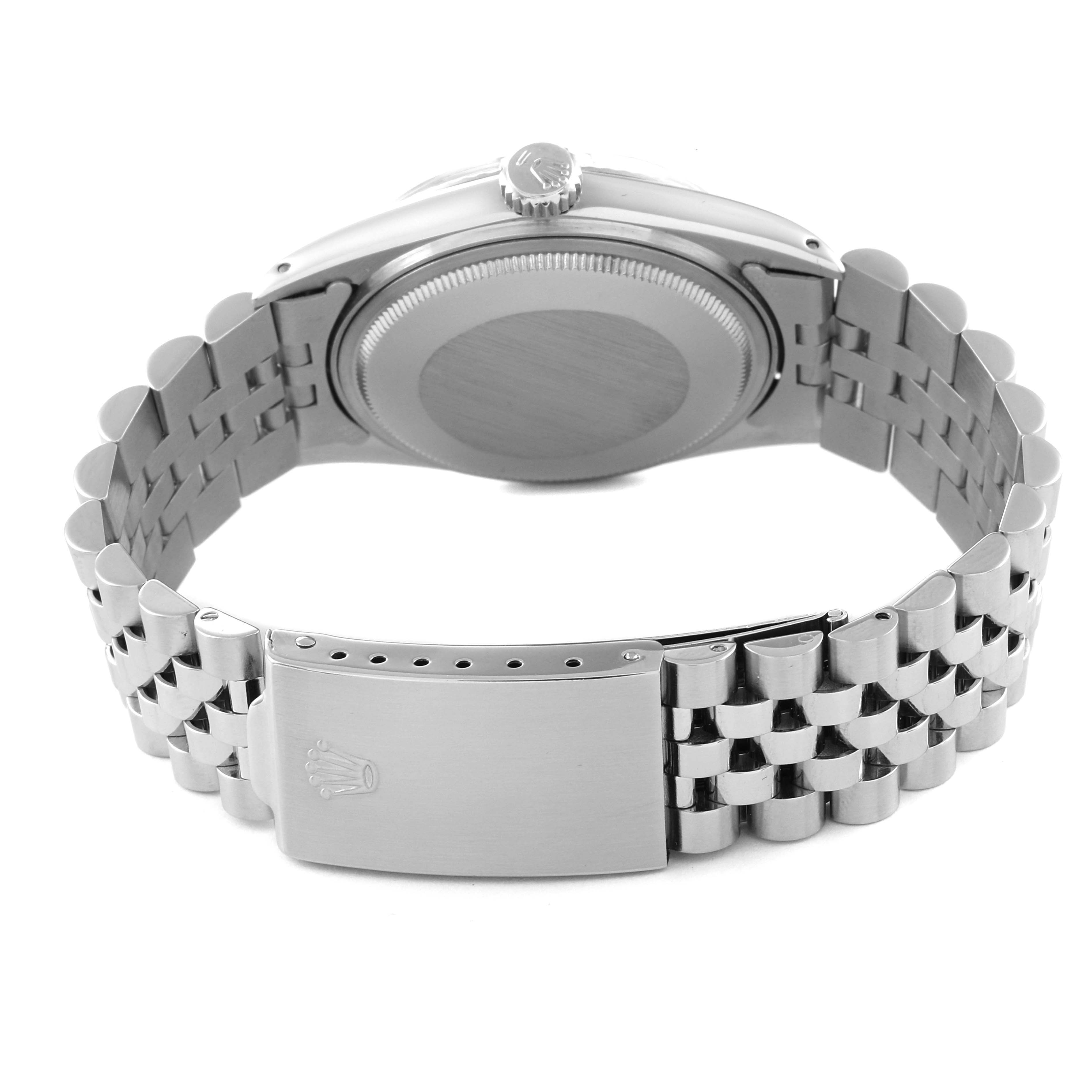 This image shows the back case and bracelet of a Vintage Collection model Rolex watch from a rear angle.