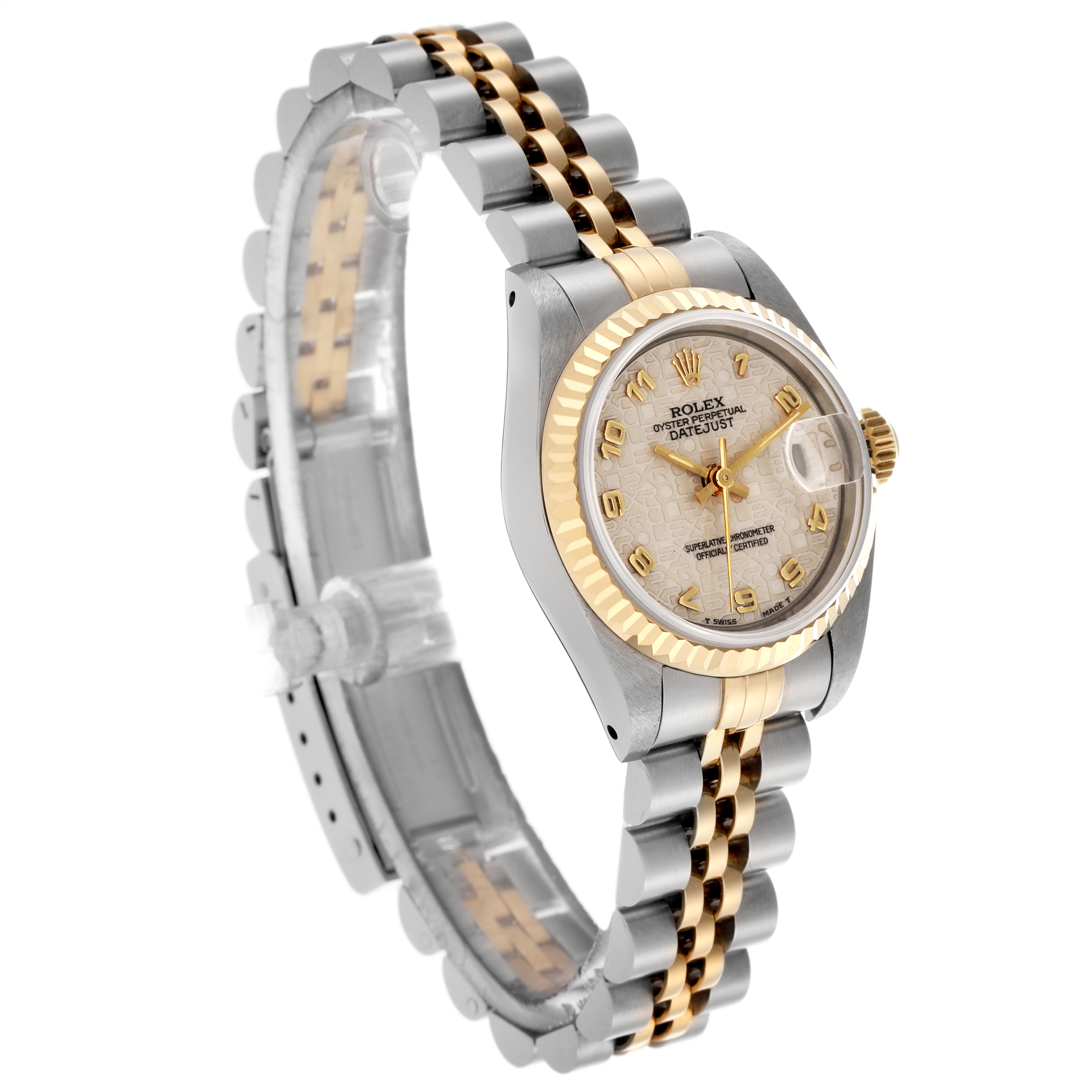 The Rolex Datejust 69173 Women
s Steel and Gold (two tone) White Dial 69173 Women
s Steel and Gold (two tone) White Dial watch is shown in a three-quarter angle displaying the face, bezel, and bracelet with a mix of gold and silver tones.