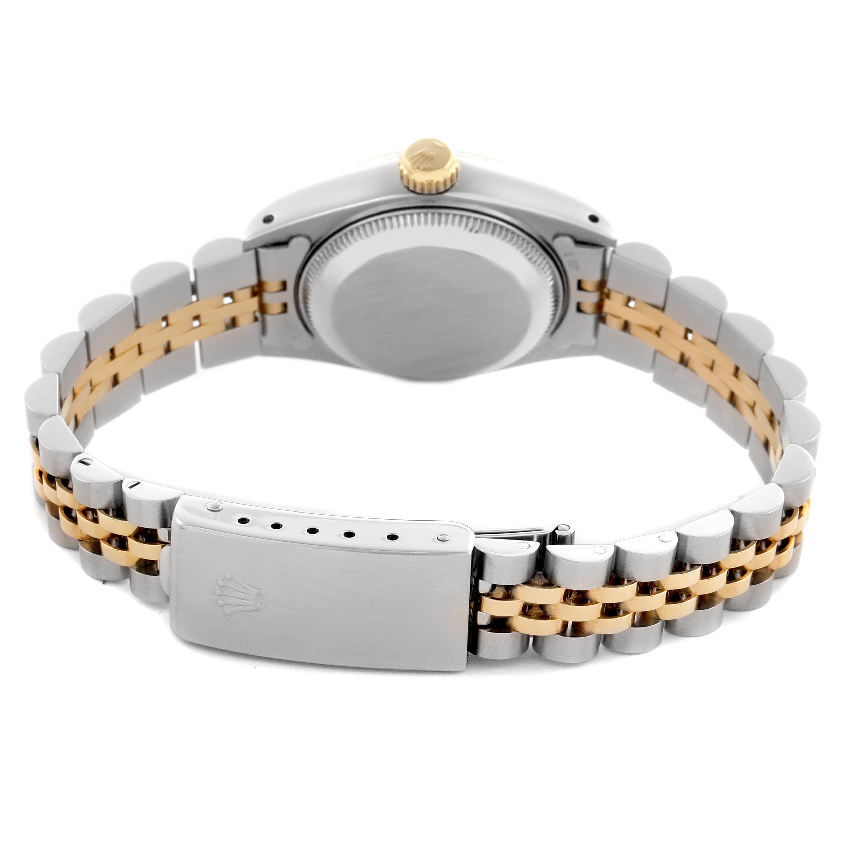 The image shows the Rolex Datejust 69173 Women
s Steel and Gold (two tone) White Dial 69173 Women
s Steel and Gold (two tone) White Dial from the back, highlighting the clasp, bracelet, and case back at a slightly elevated angle.
