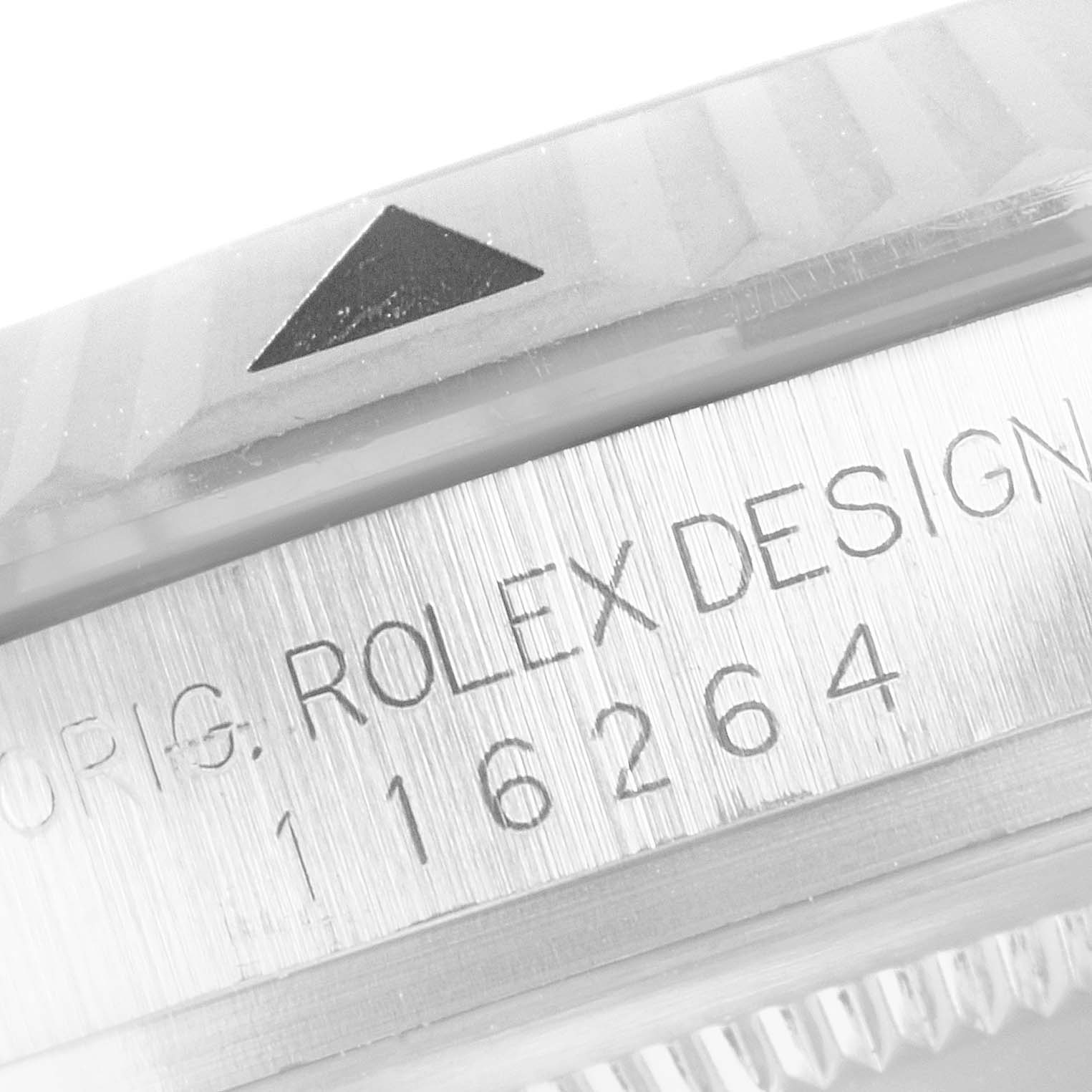 This close-up image shows the bezel and part of the Rolex Turn-o-Graph 116264 Men
s Stainless Steel Black Dial 116264 Men
s Stainless Steel Black Dial watch case with the model number 116264 engraved.