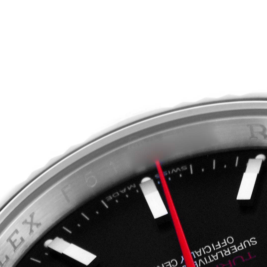 The image shows a close-up of the Rolex Turn-o-Graph 116264 Men
s Stainless Steel Black Dial 116264 Men
s Stainless Steel Black Dial watch, highlighting the bezel, part of the dial, and the red second hand.