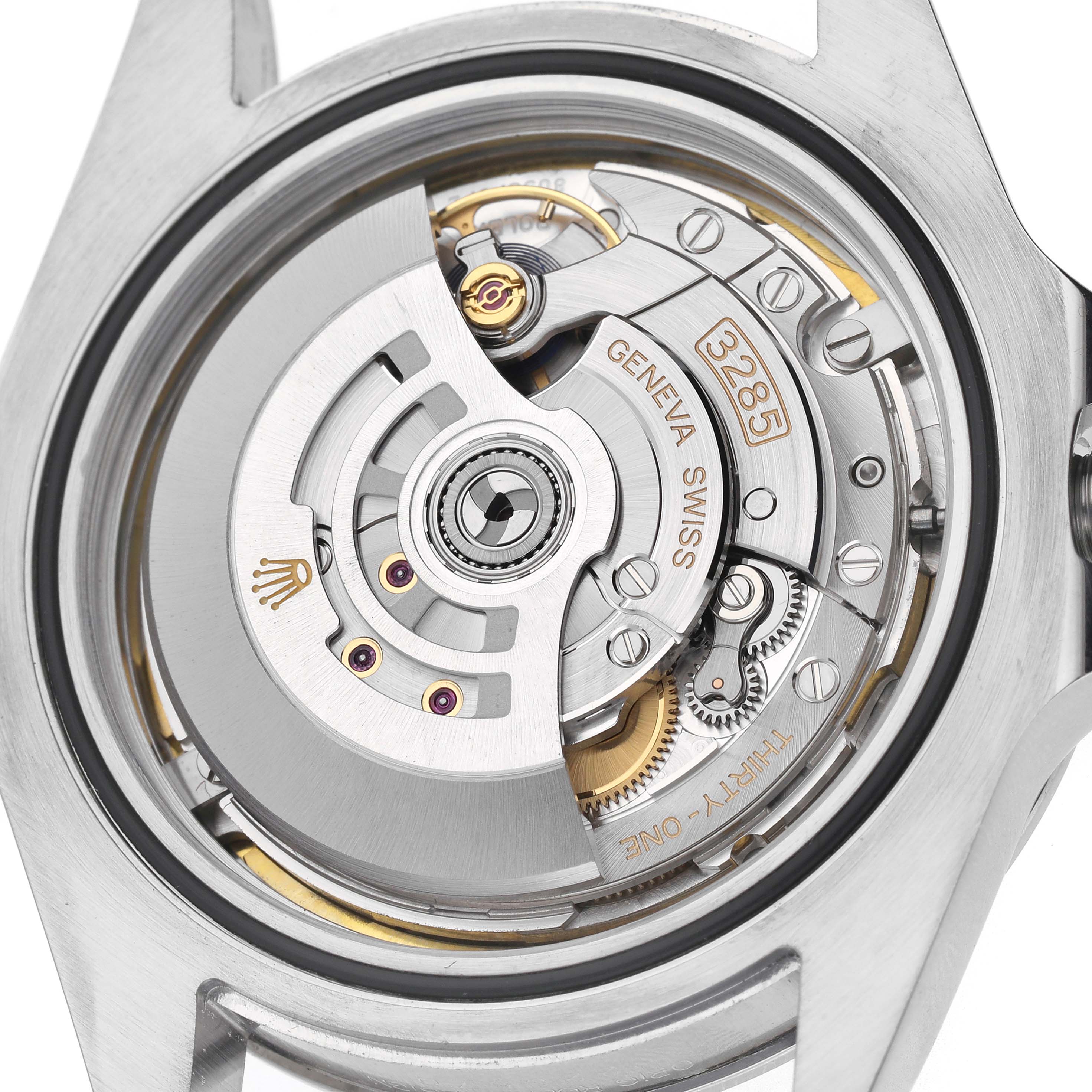 The image shows the Rolex Explorer 226570 Men
s Stainless Steel White Dial 226570 Men
s Stainless Steel White Dial watch
s movement from a rear angle, highlighting the rotor and internal mechanisms.