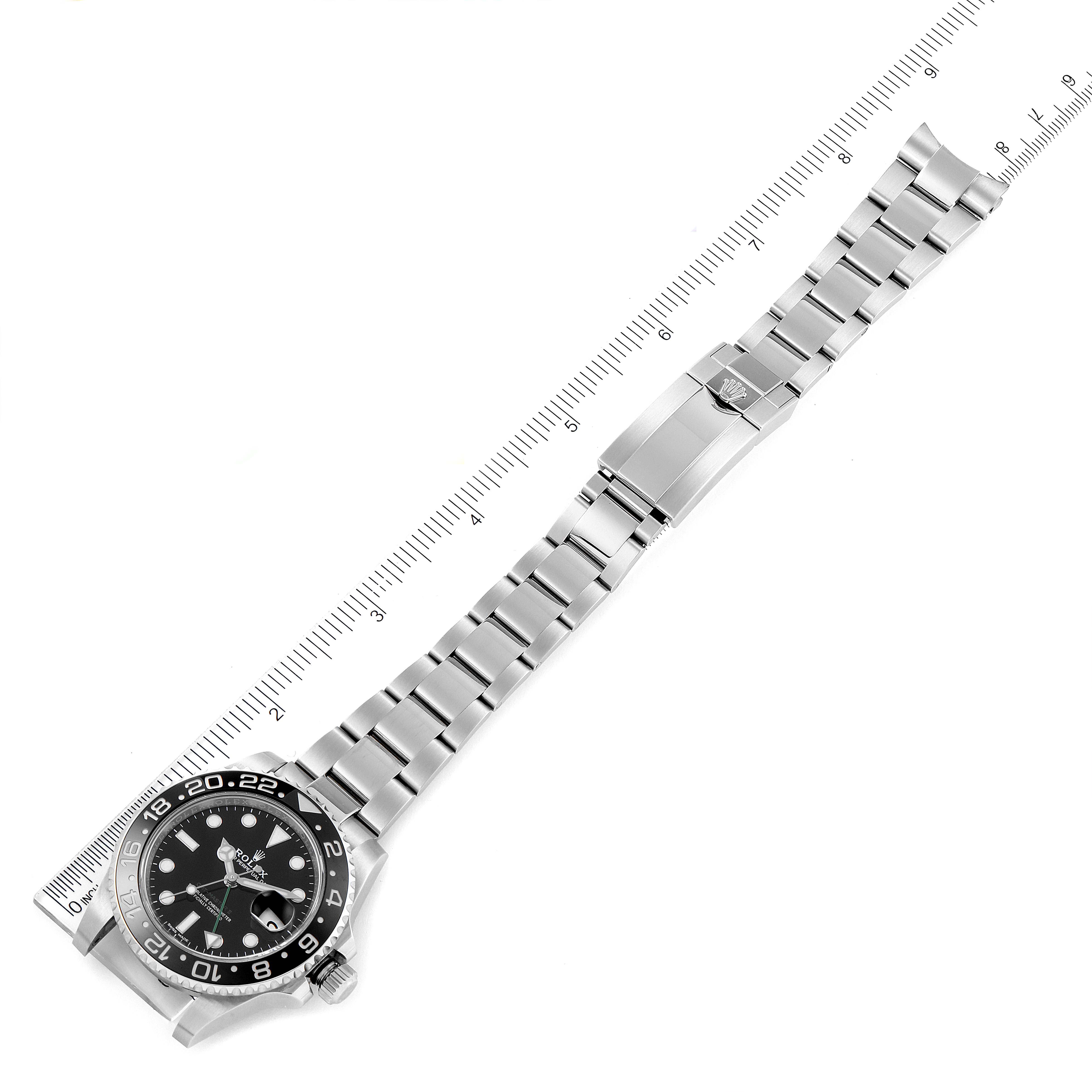 This image shows the Rolex GMT-Master 116710 Men's Stainless Steel Black Dial 116710 Men's Stainless Steel Black Dial watch laid flat with its full bracelet and clasp visible.