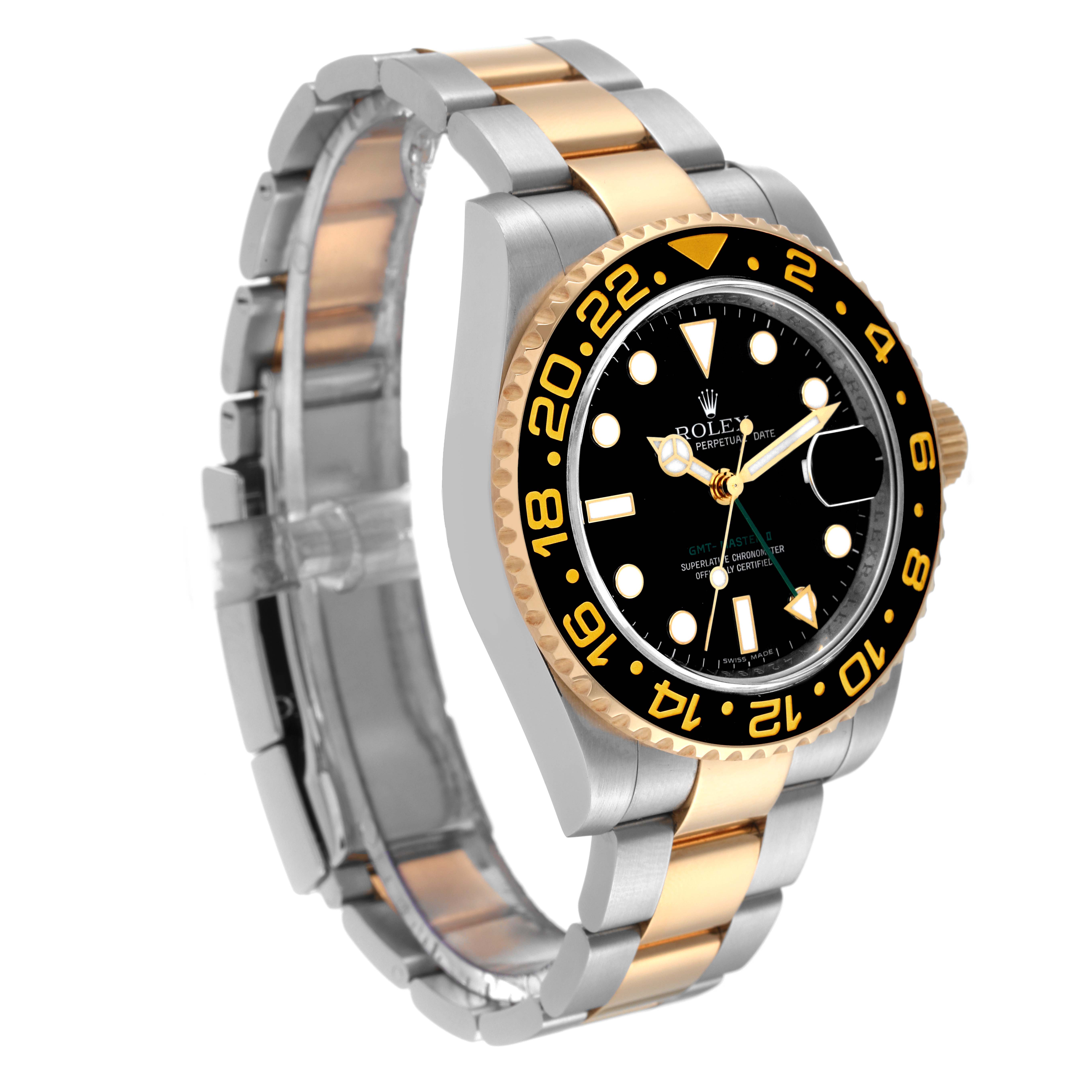 This Rolex GMT-Master 116713 Men's Steel and Gold (two tone) Black Dial 116713 Men's Steel and Gold (two tone) Black Dial watch is shown from a three-quarter angle, displaying the bezel, dial, and part of the bracelet.
