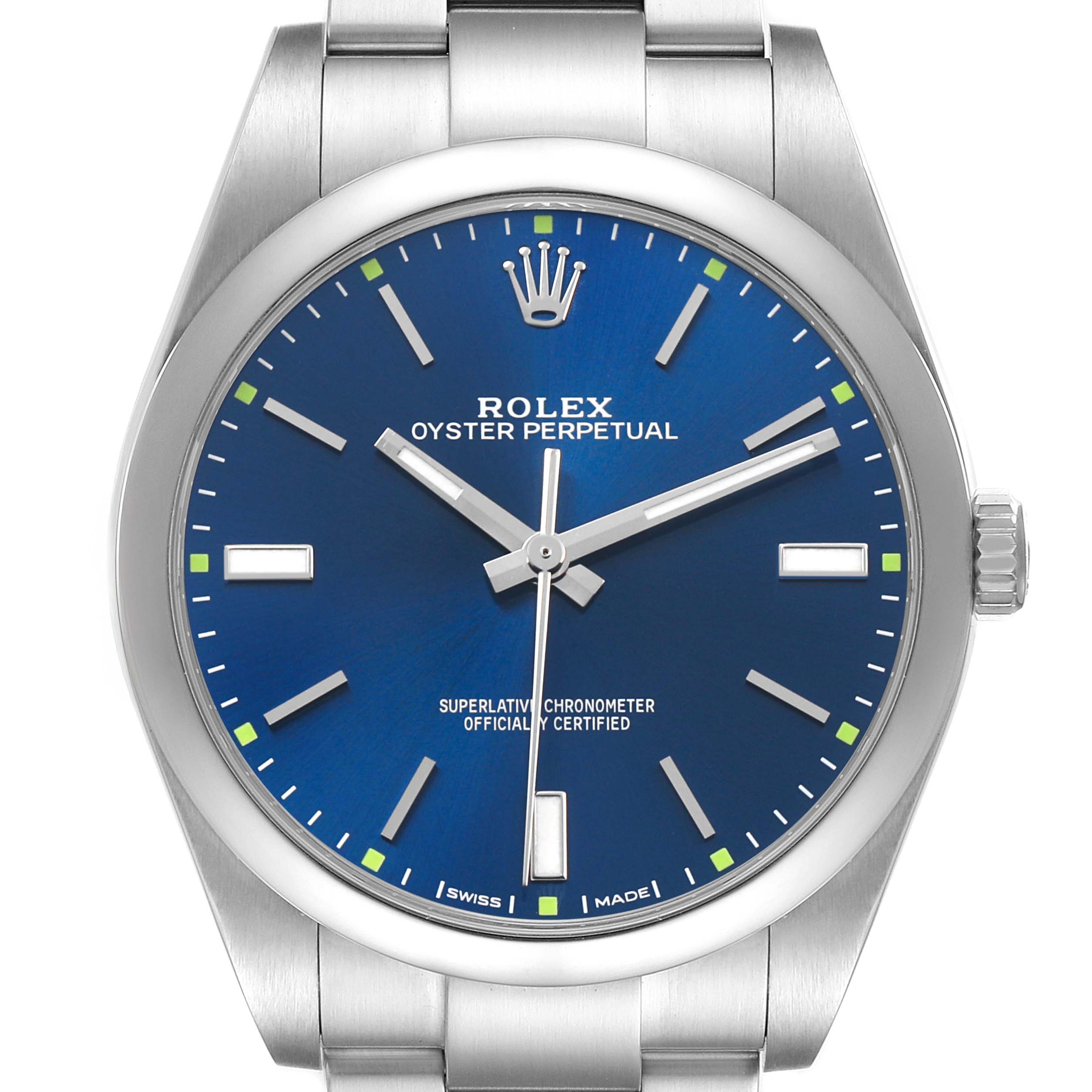 The Rolex Oyster Perpetual 114300 Men's Stainless Steel Blue Dial watch is shown from a front angle, highlighting the blue dial, crown, and part of the bracelet.