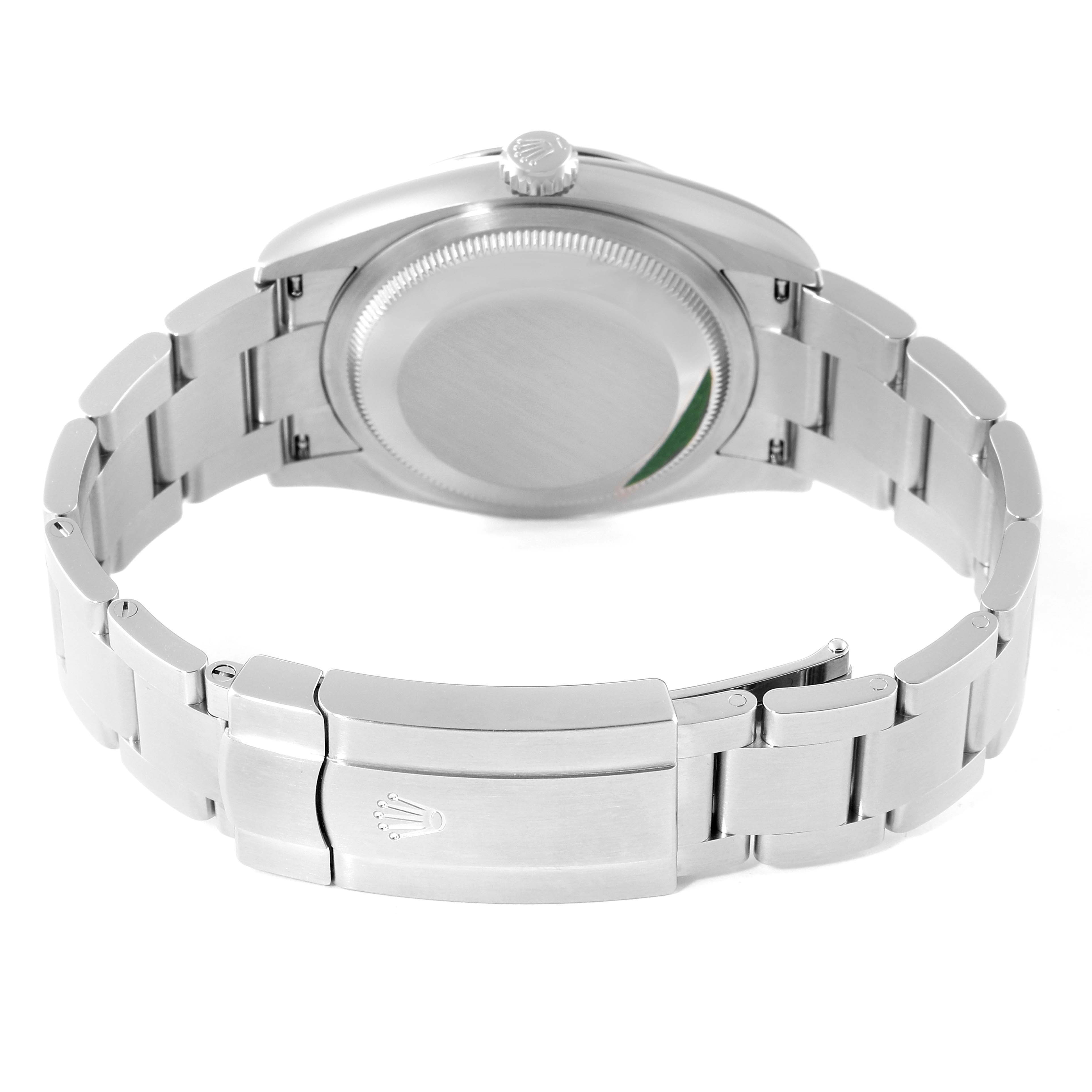 This is a rear view of a Rolex Oyster Perpetual 126000 Men's Stainless Steel Blue Dial 126000 Men's Stainless Steel Blue Dial watch showing the closed case back, bracelet links, and deployment clasp.