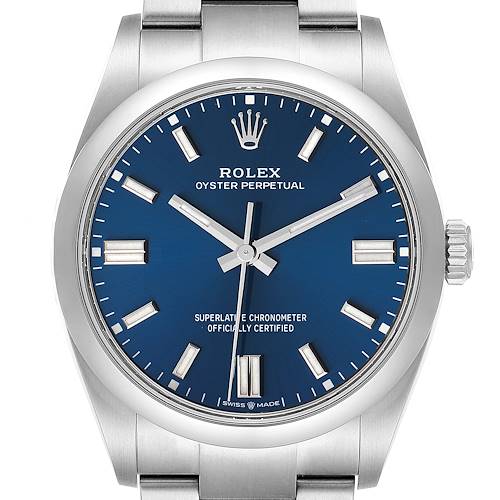 The image shows a front view of the Rolex Oyster Perpetual watch, highlighting its blue dial, markers, and stainless steel case and bracelet.