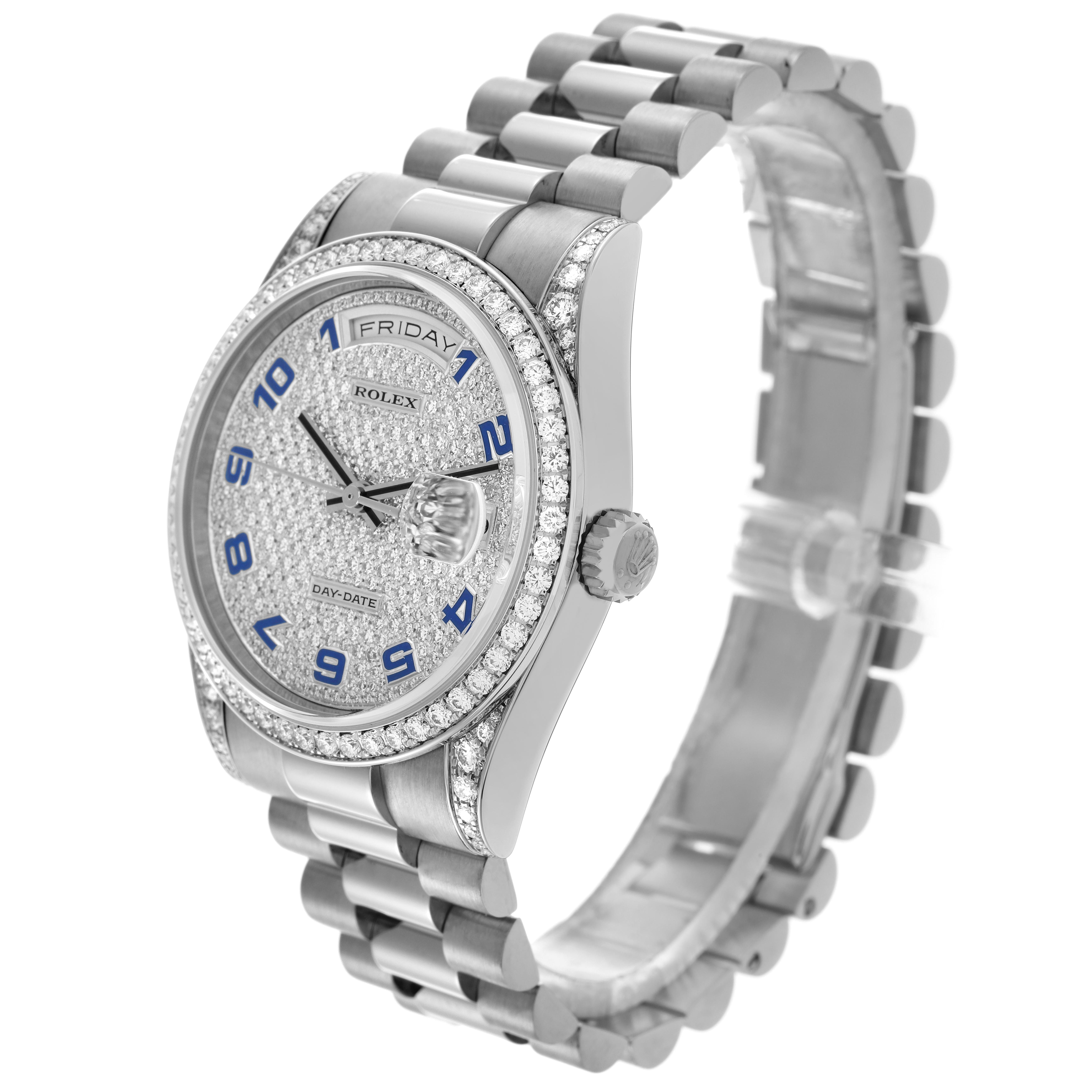 The Rolex President 118389 Men
s White Gold White Dial 118389 Men
s White Gold White Dial watch is shown at a three-quarter angle, highlighting its diamond bezel, dial, and the President bracelet.