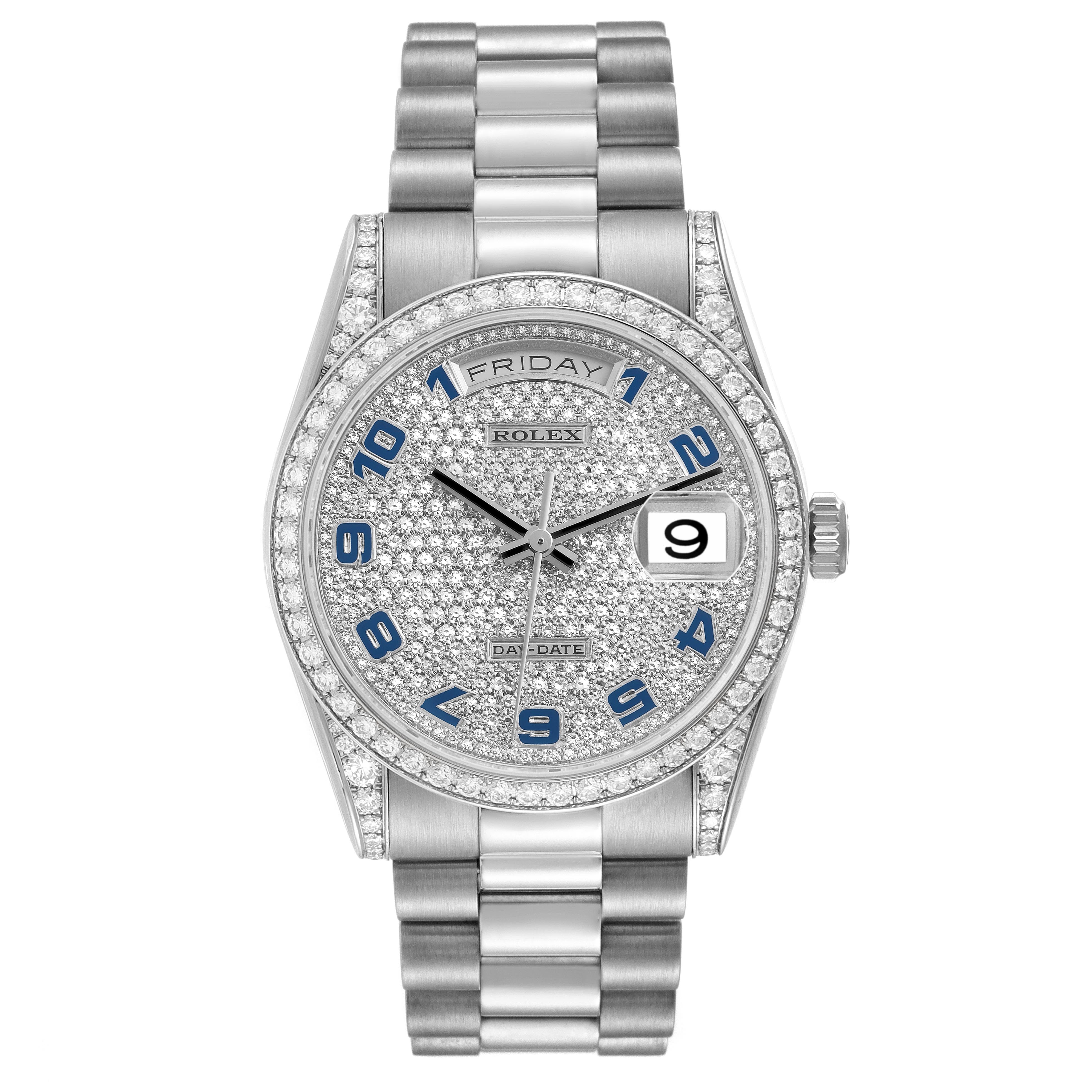The image shows a Rolex President 118389 Men
s White Gold White Dial 118389 Men
s White Gold White Dial watch from a front view, highlighting its diamond-encrusted dial and bezel with a metal bracelet.