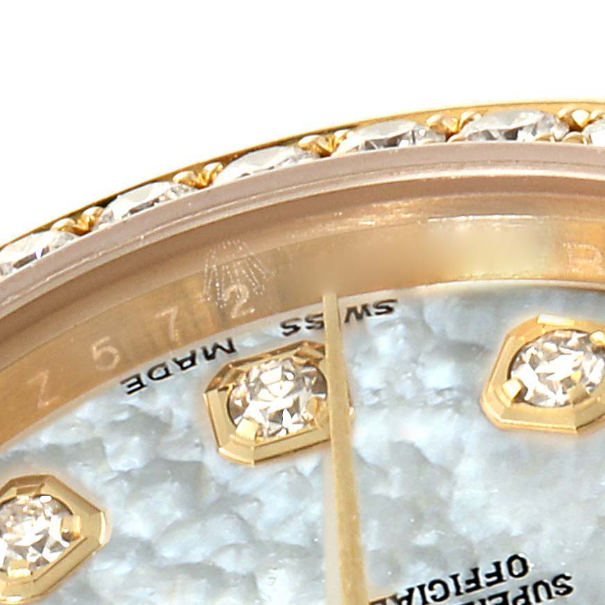 This is a close-up angle of the dial and bezel from a Rolex President 179138 Women's Yellow Gold Mother of Pearl Dial 179138 Women's Yellow Gold Mother of Pearl Dial model watch.