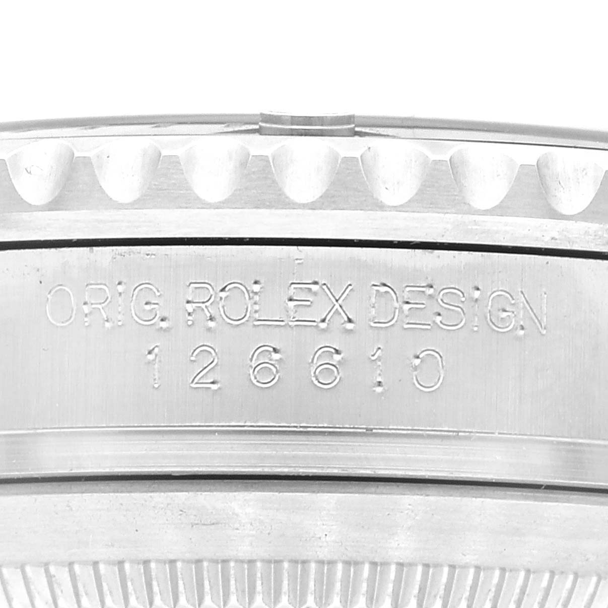 This image shows the side view of a Rolex Submariner 126610 Men
s Stainless Steel Black Dial 126610 Men
s Stainless Steel Black Dial watch case with the "ORIG. ROLEX DESIGN 126610" engraving.