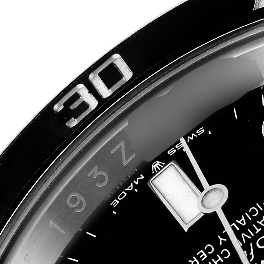 The image shows a close-up of the bezel and dial of a Rolex Submariner 126610 Men
s Stainless Steel Black Dial 126610 Men
s Stainless Steel Black Dial watch, focusing on the "30" marker and part of the minute hand.