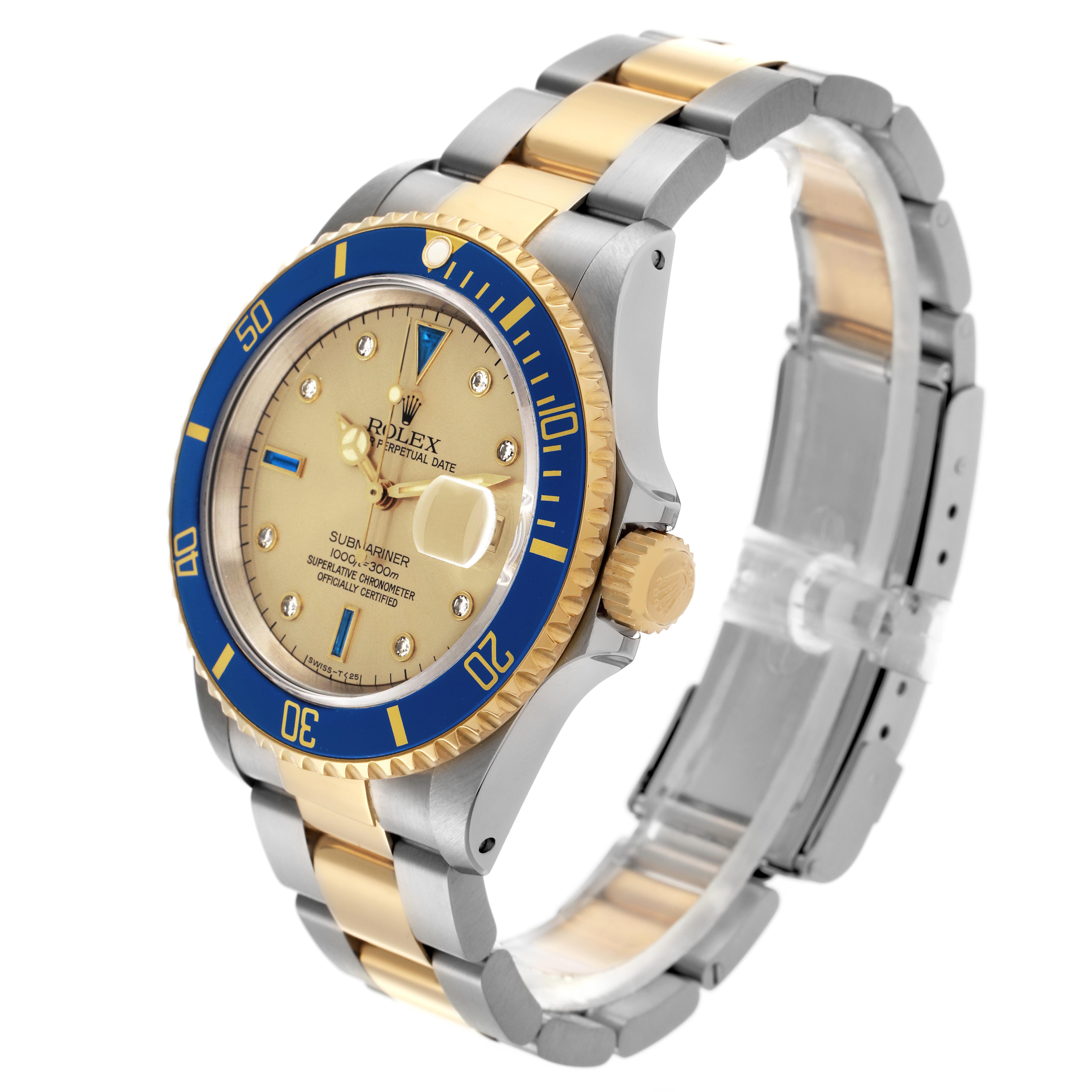 The Rolex Submariner 16613 Men
s Steel and Gold (two tone) Champagne Dial 16613 Men
s Steel and Gold (two tone) Champagne Dial watch is shown at an angled side view, displaying the dial, bezel, crown, and two-tone bracelet.