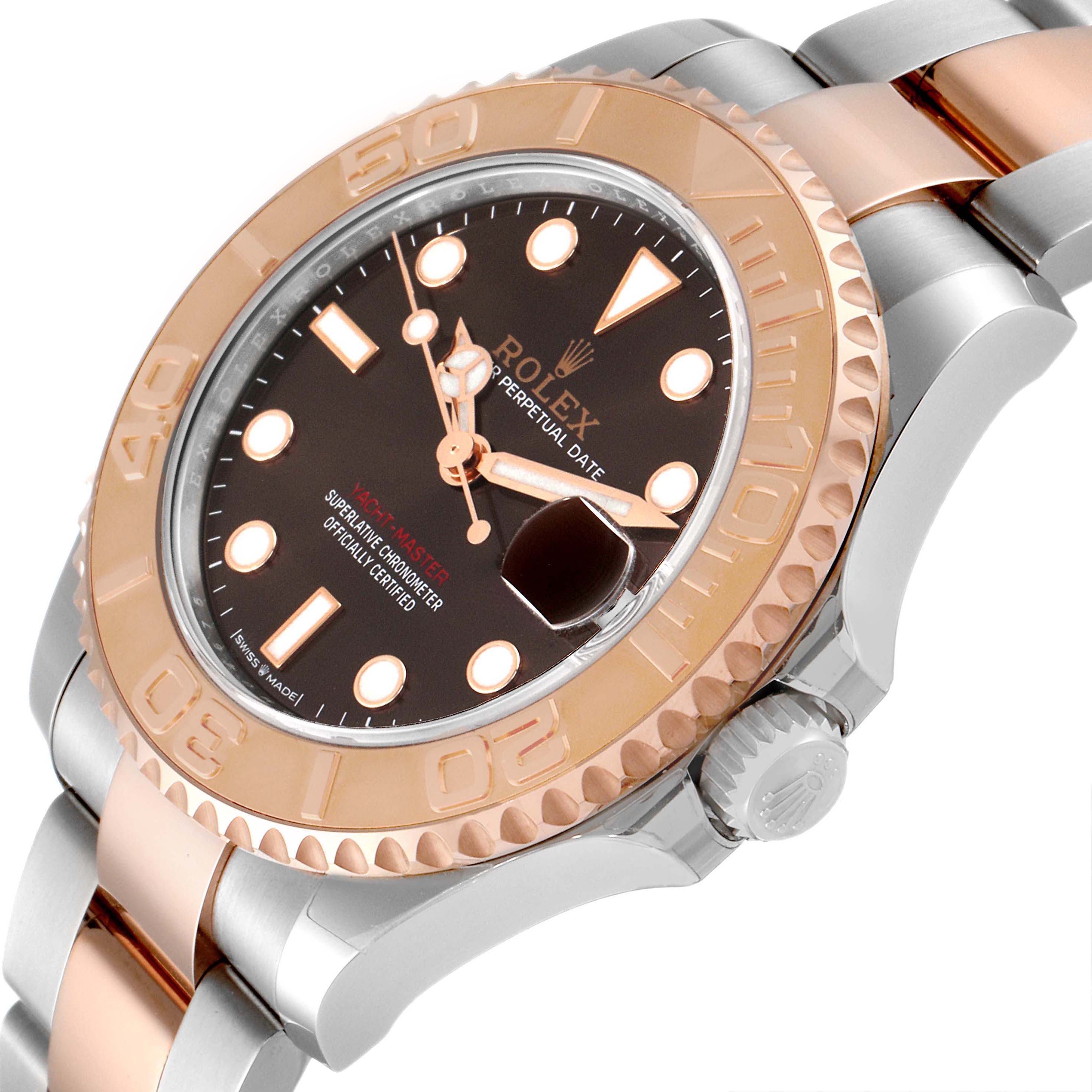 The image shows a close-up angle of a Rolex Yacht-Master 268621 Men's Steel and Gold (two tone) Brown Dial 268621 Men's Steel and Gold (two tone) Brown Dial watch emphasizing the dial, bezel, and crown.