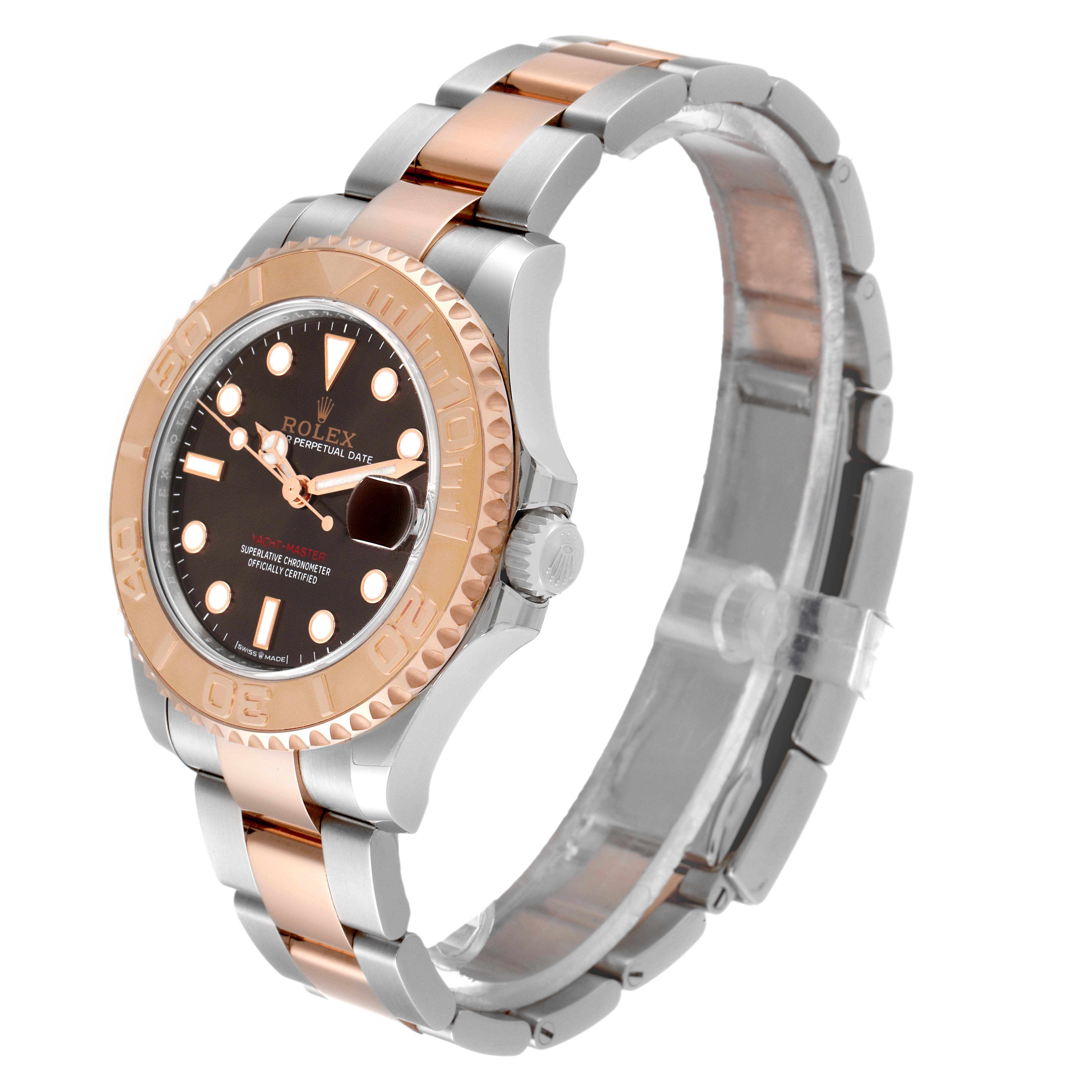 This is a top-side angled view of a Rolex Yacht-Master 268621 Men's Steel and Gold (two tone) Brown Dial 268621 Men's Steel and Gold (two tone) Brown Dial watch, showcasing its bezel, dial, and two-tone bracelet.