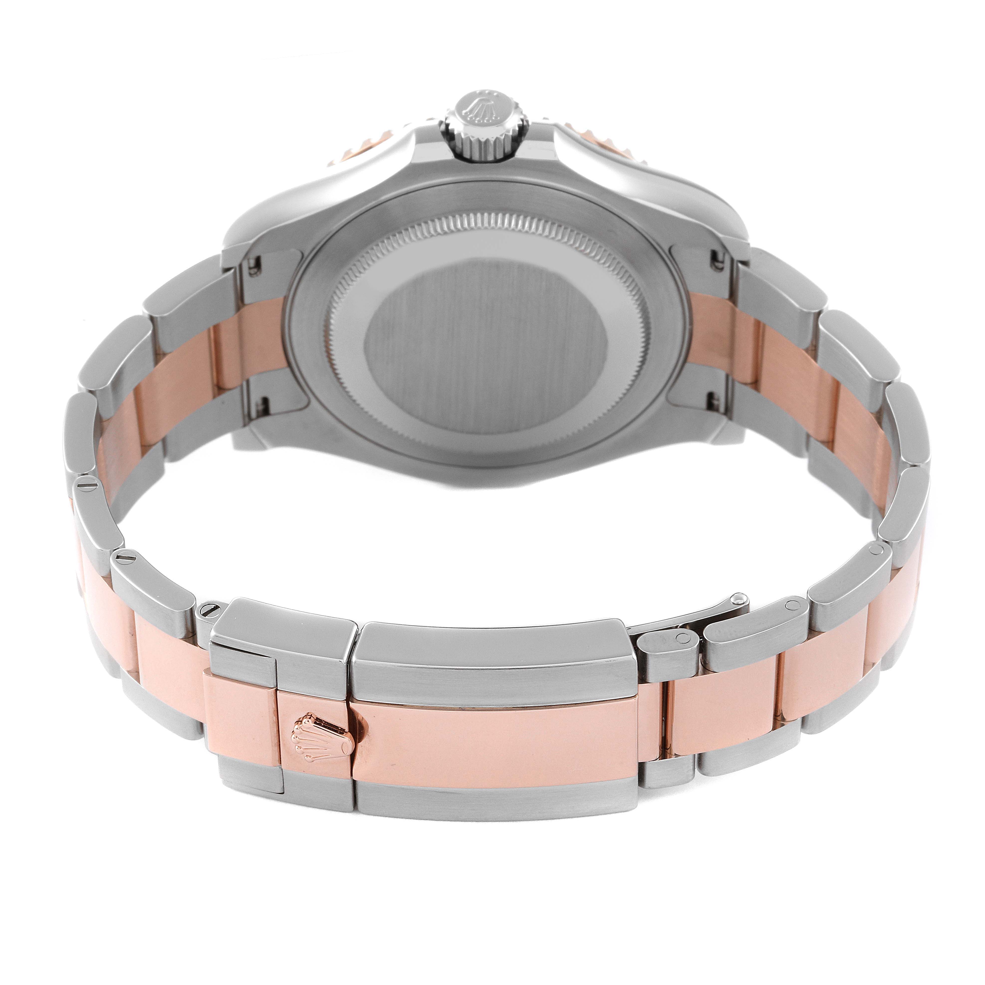 The image shows the back of the watch case and the bracelet of a Rolex Yacht-Master 126621 Men's Steel and Gold (two tone) Brown Dial 126621 Men's Steel and Gold (two tone) Brown Dial watch.