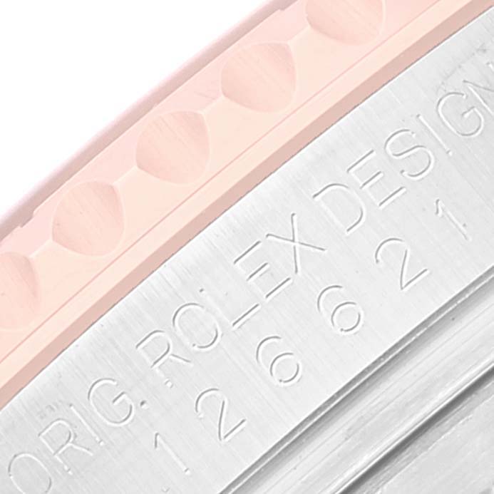 Close-up of the engraved inner bezel and edge of the bezel on a Rolex Yacht-Master 126621 Men's Steel and Gold (two tone) Brown Dial 126621 Men's Steel and Gold (two tone) Brown Dial watch.