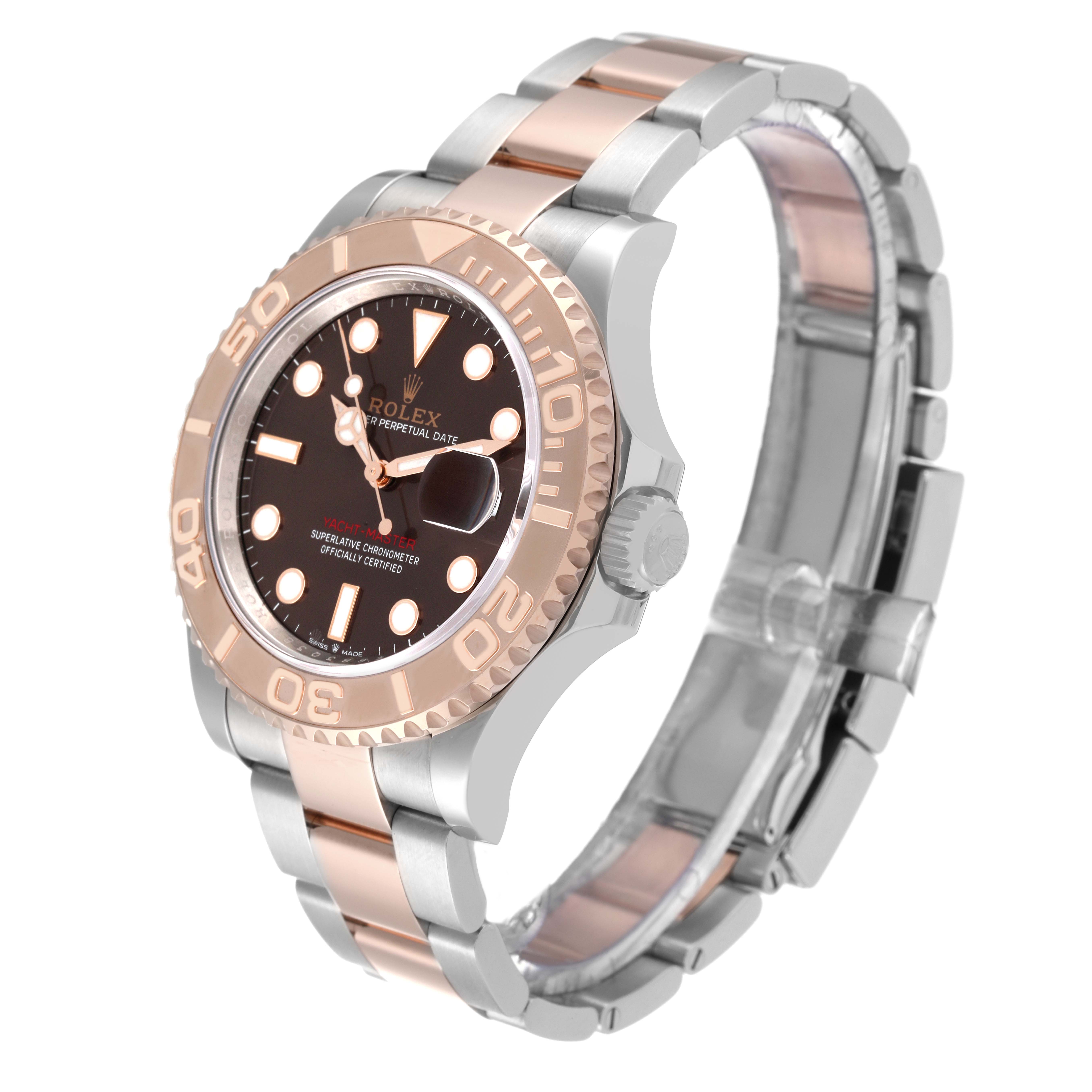 The image shows a side angle of the Rolex Yacht-Master 126621 Men's Steel and Gold (two tone) Brown Dial 126621 Men's Steel and Gold (two tone) Brown Dial watch, highlighting its bezel, dial, crown, and bracelet.