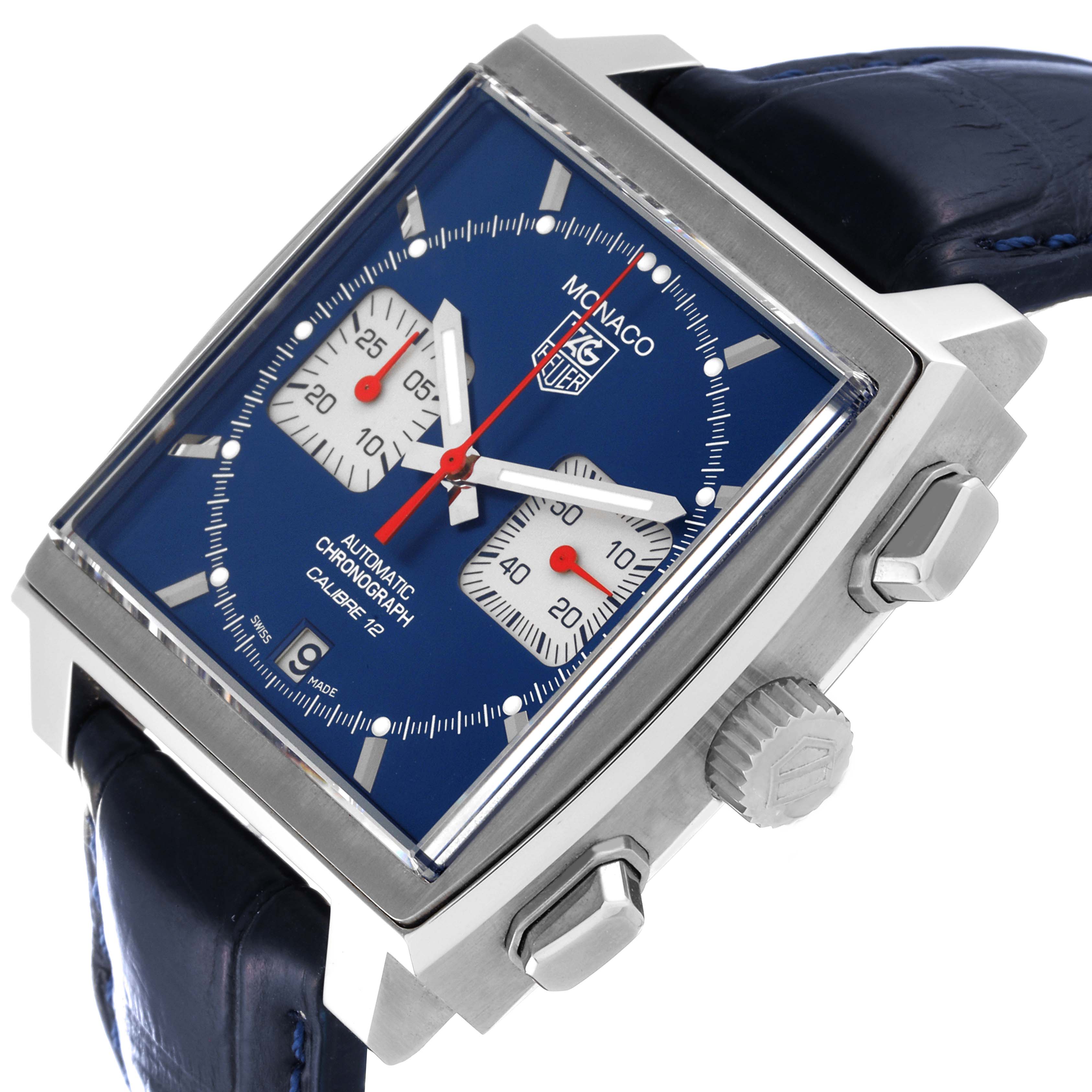 The image shows a close-up angle of the Tag Heuer Monaco CAW2111 Men's Stainless Steel Blue Dial CAW2111 Men's Stainless Steel Blue Dial watch face, crown, pushers, and part of the blue leather strap.
