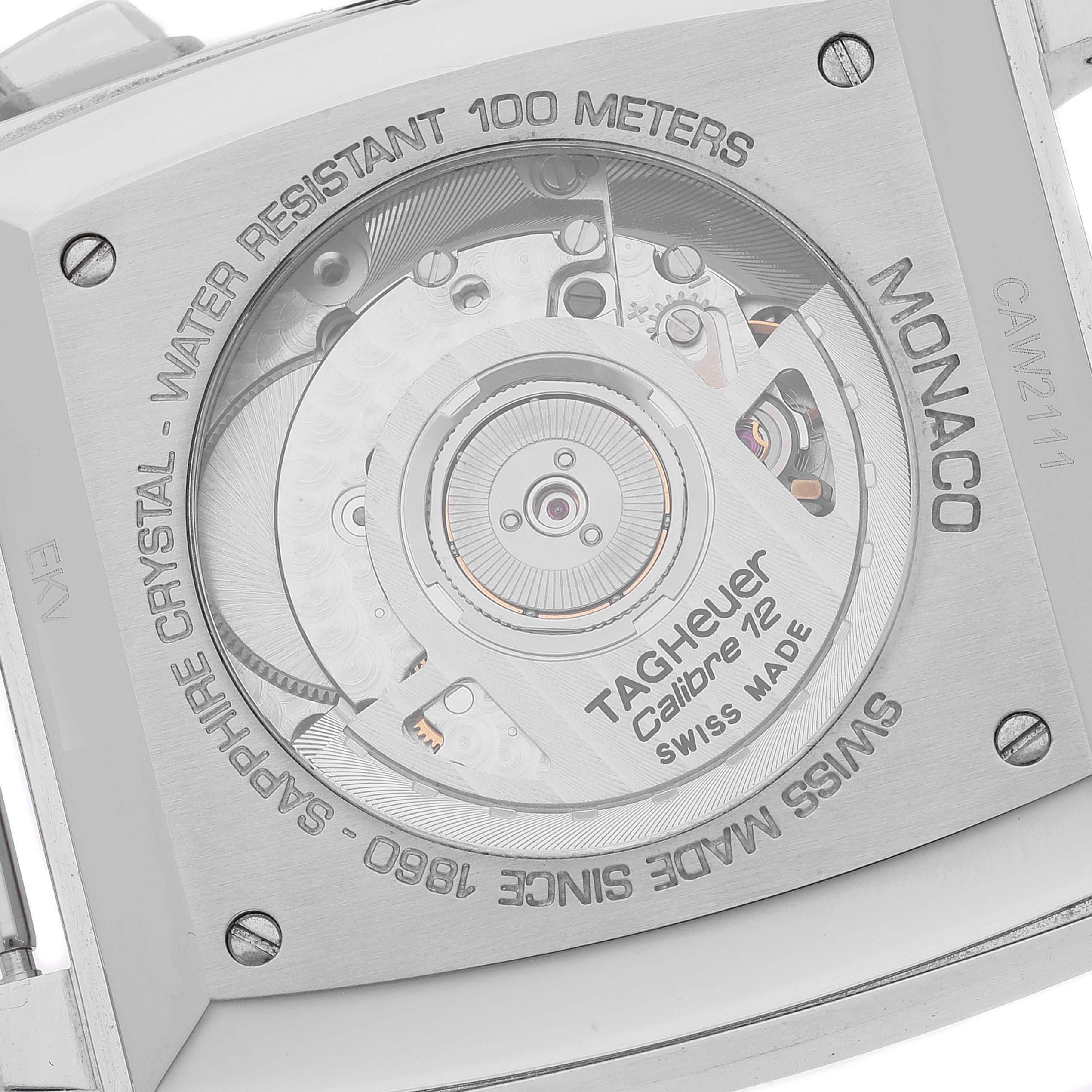 This is a close-up shot of the back of the Tag Heuer Monaco CAW2111 Men's Stainless Steel Blue Dial CAW2111 Men's Stainless Steel Blue Dial watch, showing the Calibre 12 mechanism.