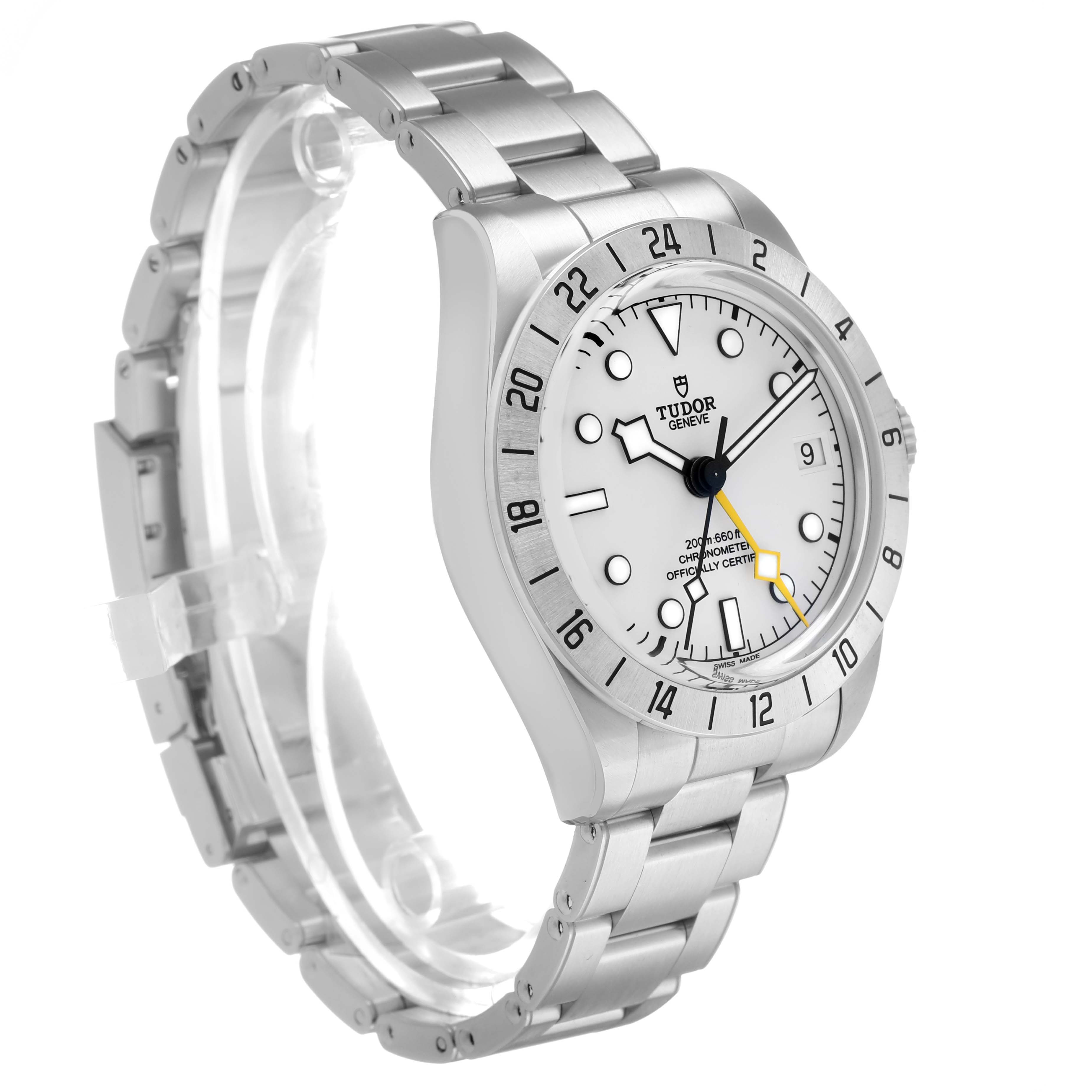 The Tudor Heritage Black Bay M79470-0004 Men's Stainless Steel White Dial watch is shown at a slight angle, displaying its face, bezel, and part of the bracelet.