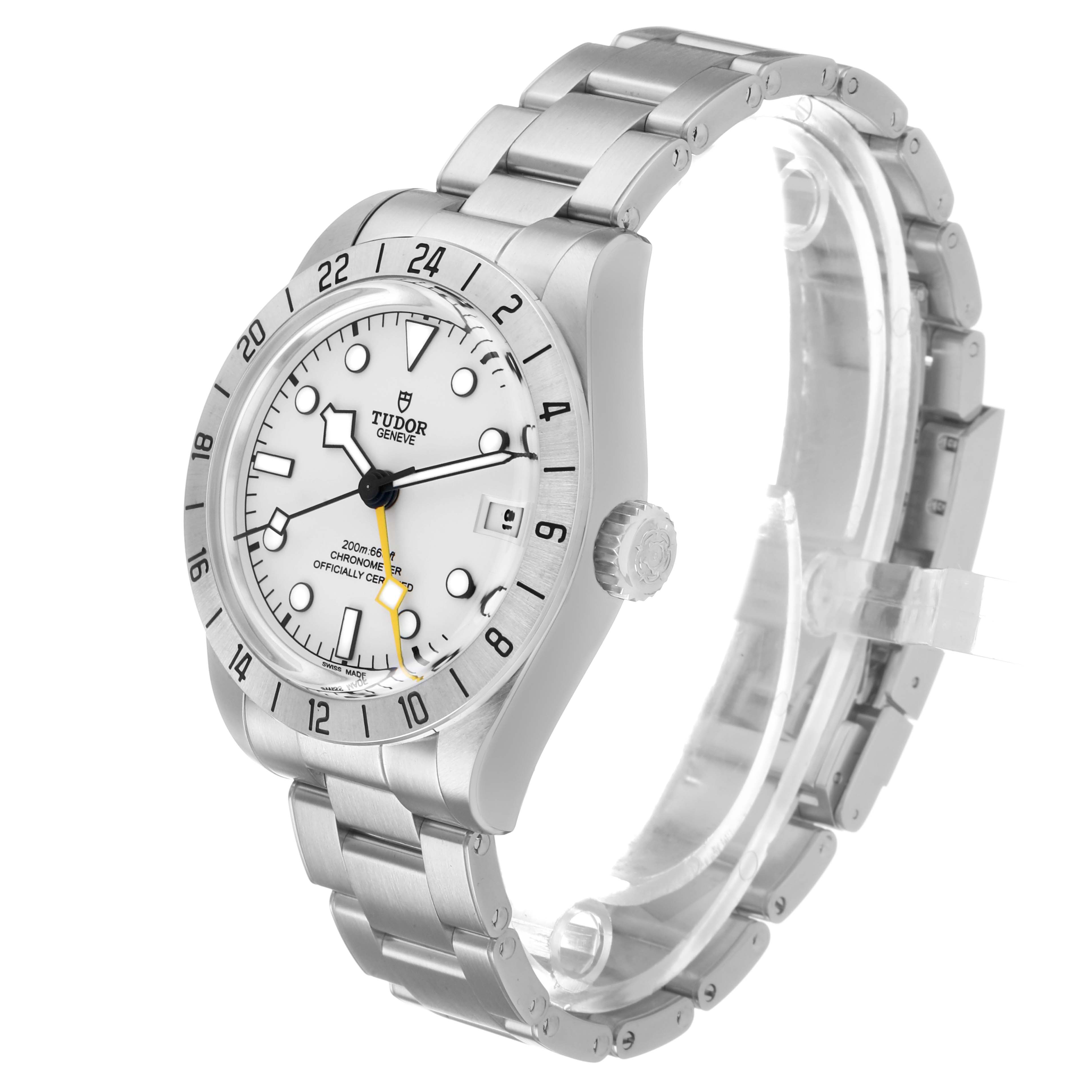 The Tudor Heritage Black Bay M79470-0004 Men's Stainless Steel White Dial watch is shown at a front-side angle, displaying the face, bezel, crown, and bracelet.