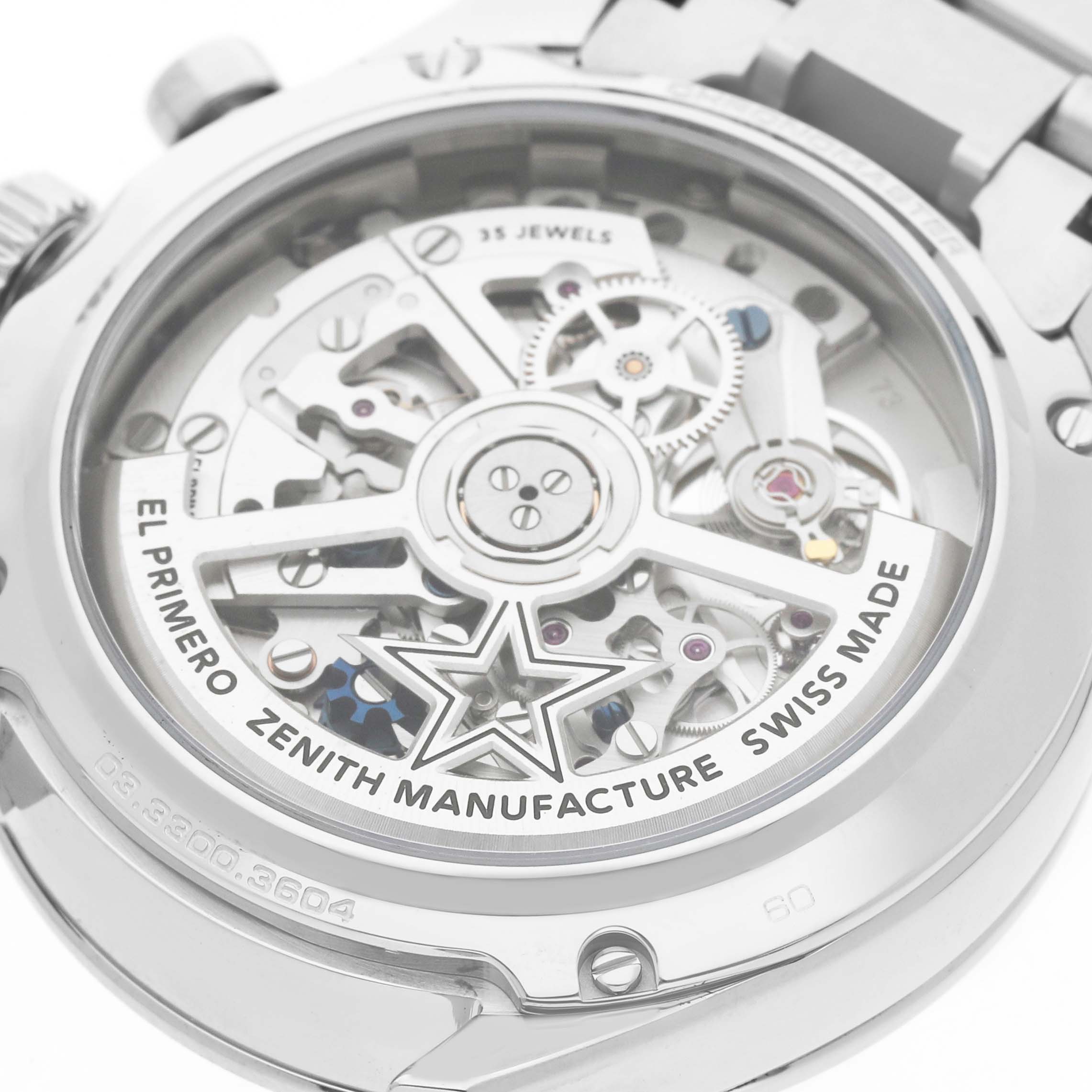 The image shows the case back of the Zenith Chronomaster 03.3300.3604 / 21.M3300 Men's Stainless Steel Black Dial, highlighting the El Primero movement and inner mechanisms.
