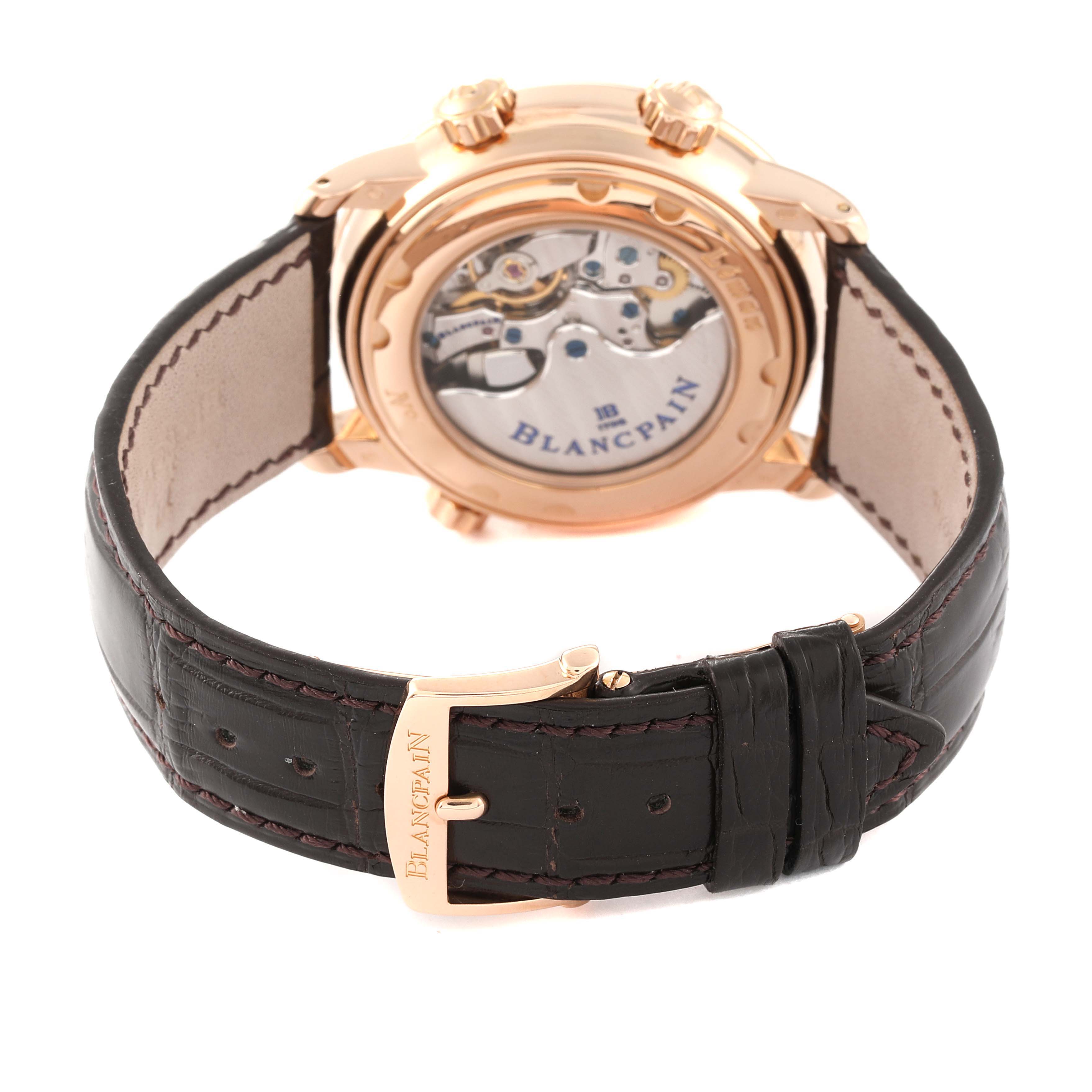 The image shows the back view of a Blancpain Metiers de Art 2841-3642-53B Men's Rose Gold Silver Dial 2841-3642-53B Men's Rose Gold Silver Dial watch, including the transparent case back and leather strap with a clasp.